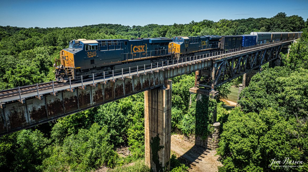 CSXT 3245 leads one of the hottest intermodals southbound on the subdivision across the Red River Trestle at Adams, Tennessee on June 24th, 2024 along the CSX Henderson Subdivision. This train typically runs with a string of autoracks also that contain Tesla automobiles bound for Florida. Right behind the second engine is a geometry track inspection boxcar that also typically runs with them.

Tech Info: DJI Mavic 3 Classic Drone, RAW, 22mm, f/2.8, 1/2000, ISO 160.

#railroad #railroads #train, #trains #railway #railway #steamtrains #railtransport #railroadengines #picturesoftrains #picturesofrailways #besttrainphotograph #bestphoto #photographyoftrains #steamtrainphotography #bestsoldpicture #JimPearsonPhotography