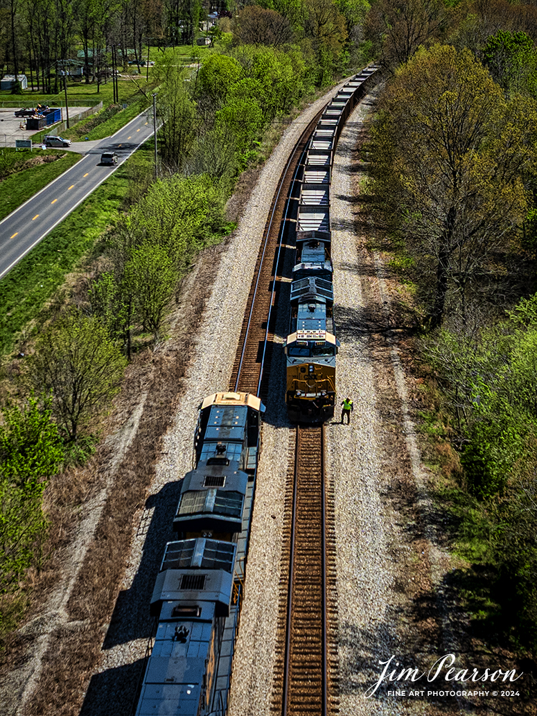 CSXT 3122 leads loaded coal train C302 as it meets E302 just south of the location known as Oak Hill, south of Mortons Gap, Kentucky on April 13th, 2024, on the CSX Henderson Subdivision as the conductor on E302 does a roll-by inspection of the loaded coal train.

Tech Info: DJI Mavic 3 Classic Drone, RAW, 22mm, f/8, 1/2000, ISO 110.

#trainphotography #railroadphotography #trains #railways #jimpearsonphotography #trainphotographer #railroadphotographer #dronephoto #trainsfromadrone #CSX