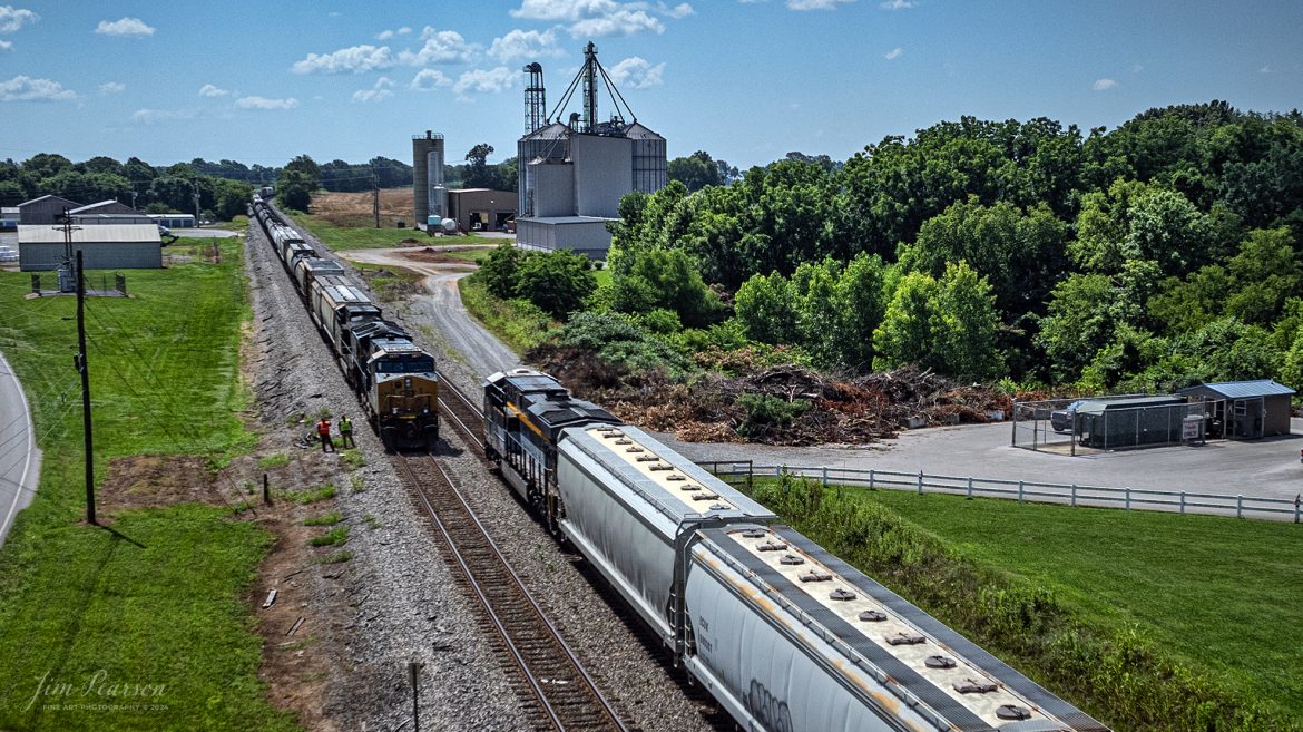 CSX Chesapeake and Ohio Heritage unit 1868 leads M503 as it heads south meeting M502 in the siding at Trenton, Kentucky, on the Henderson Subdivision on the first day of summer, June 20th, 2024.

From a CSX Press Release: A locomotive commemorating the proud history of the Chesapeake and Ohio Railway has entered service as the fifth in the CSX heritage series celebrating the lines that came together to form the modern railroad.

Numbered CSX 1869 in honor of the year the C&O was formed in Virginia from several smaller railroads, the newest heritage locomotive sports a custom paint design that includes today’s CSX colors on the front of the engine and transitions to a paint scheme inspired by 1960s era C&O locomotives on the rear two-thirds.

The C&O Railway was a major line among North American freight and passenger railroads for nearly a century before becoming part of the Chessie System in 1972 and eventually merging into the modern CSX. In 1970, the C&O included more than 5,000 route miles of track stretching from Newport News, Virginia, to Chicago and the Great Lakes.

Tech Info: DJI Mavic 3 Classic Drone, RAW, 22mm, f/2.8, 1/4000, ISO 120.

#railroad #railroads #train #trains #bestphoto #railroadengines #picturesoftrains #picturesofrailway #bestphotograph #photographyoftrains #trainphotography #JimPearsonPhotography #trendingphoto #csxt #trainsfromadrone #csxheritage