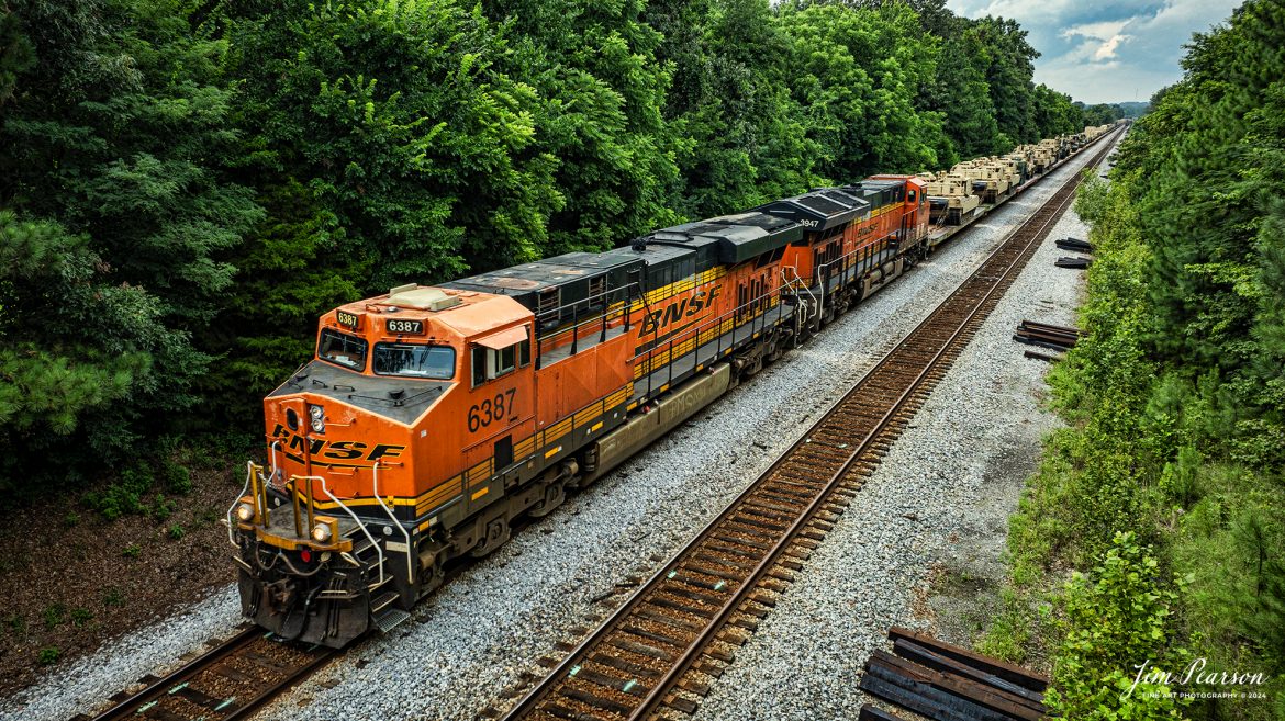 BNSF 6387 and 3947 lead a long CSX S577 as they head north at Slaughters, Kentucky with a loaded military train bound for Ft. Campbell on the CSX Henderson Subdivision on July 9th, 2024

Tech Info: DJI Mavic 3 Classic Drone, RAW, 22mm, f/2.8, 1/640, ISO 180.

#railroad #railroads #train #trains #bestphoto #railroadengines #picturesoftrains #picturesofrailway #bestphotograph #photographyoftrains #trainphotography #JimPearsonPhotography #trendingphoto #militarytrains