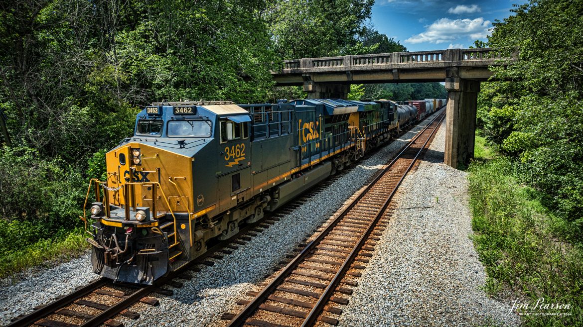 CSX M647 heads southbound under the Ky 62 overpass, with CSXT 3462 leading the way, on the CSX Henderson Subdivision, on July 19th, 2024 at Nortonville, Kentucky. 

Tech Info: DJI Mavic 3 Classic Drone, RAW, 22mm, f/2.8, 1/1600, ISO 110.

#railroad #railroads #train, #trains #railway #railway #steamtrains #railtransport #railroadengines #picturesoftrains #picturesofrailways #besttrainphotograph #bestphoto #photographyoftrains #steamtrainphotography #bestsoldpicture #JimPearsonPhotography