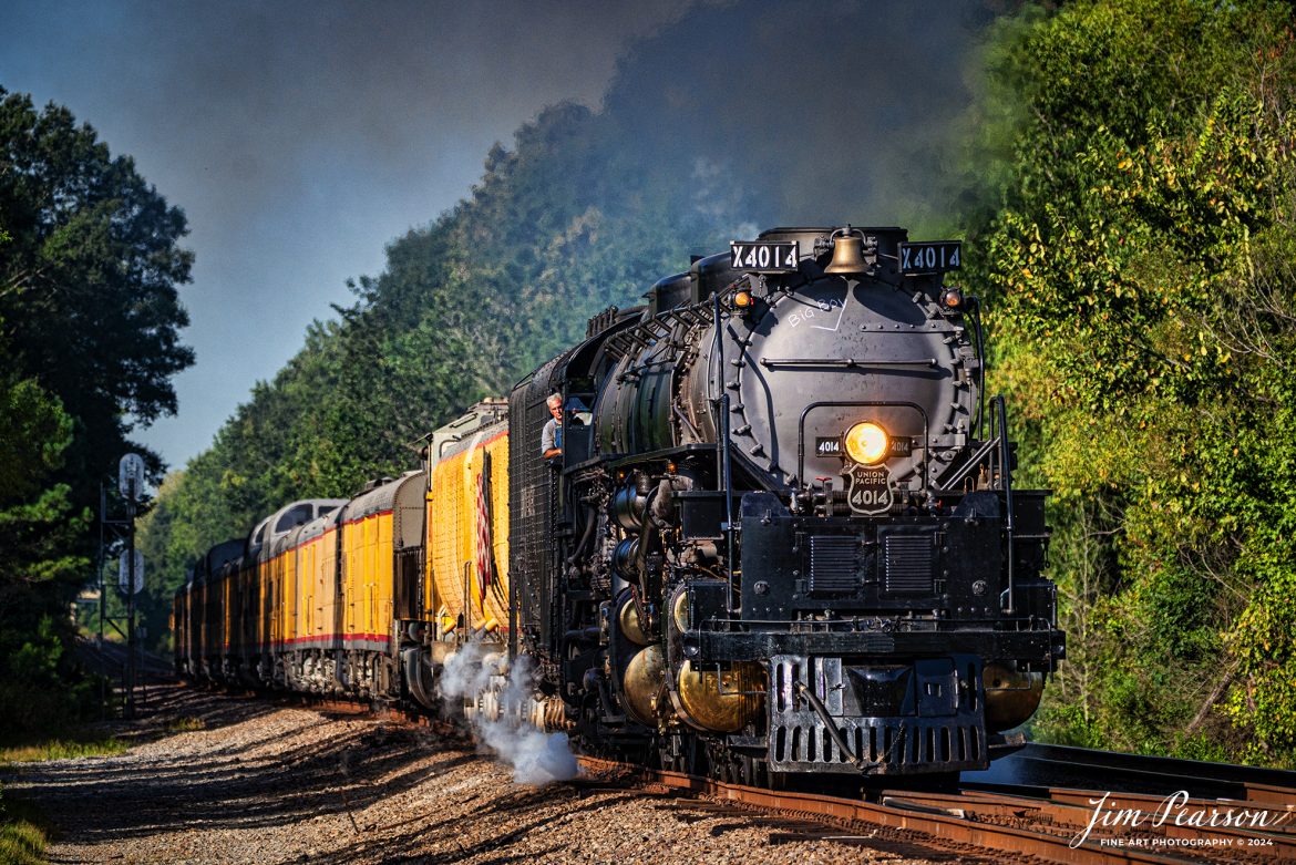 Union Pacific 4014, the Big Boy heads north on UP’s Hoxie Subdivision at Jacksonville, Arkansas as part of its 2021-month long tour around the United States on August 27th, 2021! 

Here engineer Ed Dickens keeps an eye on the tracks ahead as it approaches the N JP Wright Loop Road crossing, perhaps scanning for the legendary the Loop Road Monster (Bigfoot) which has been sighted in this rural area in the past, but there wasn’t any sight of him during the big boys run through the area! I guess bigfoot doesn’t like steam trains nearly as much as the throngs of railfans that chased it!

UP 4014 is an articulated 4-8-8-4 steam locomotive that was manufactured by the American Locomotive Company. There were a total 25 of these giants built and of the eight remaining locomotives this is the only operational one.

The Big Boy was on a month-long tour around the Midwest through, Arkansas, Colorado, Kansas, Illinois, Louisiana, Missouri, Nebraska, Oklahoma, Texas, and Wyoming before arriving home in Cheyenne, Wyoming on September 7th, 2021.

Tech Info: Nikon D800, RAW, Sigma 150-600mm @ 210mm, f/5.3, 1/1600, ISO 280.

#trainphotography #railroadphotography #trains #railways #jimpearsonphotography