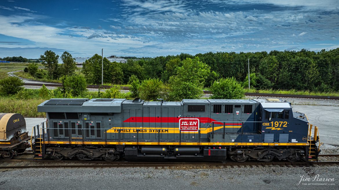 CSX M513 heads south out of Casky Yard as it continues it's run south from Hopkinsville, Kentucky, with CSX Heritage Unit L&N 1972 Family Lines System Leading, on August 16th, 2024, on the Henderson Subdivision.

According to CSXT: Our fleet of heritage locomotives is growing again as we unveil CSX Locomotive 1972, a tribute to the Family Lines System! The #ONECSX team in Waycross, GA recreated this unit to celebrate the special time from 1972-1982 when the Seaboard Coast Line, Clinchfield and L&N railroads were marketed as one. Eventually merging to become the Seaboard System Railroad, and ultimately the CSX we know today, the Family Lines System represents an integral part of our railroad’s rich history.

The CSX heritage series is reinforcing employee pride in the history of the railroad that continues to move the nation’s economy with safe, reliable, and sustainable rail-based transportation services.

Tech Info: DJI Mavic 3 Classic Drone, RAW, 22mm, f/2.8, 1/2500, ISO 170.

#railroad #railroads #train #trains #bestphoto #railroadengines #picturesoftrains #picturesofrailway #bestphotograph #photographyoftrains #trainphotography #JimPearsonPhotography #trendingphoto