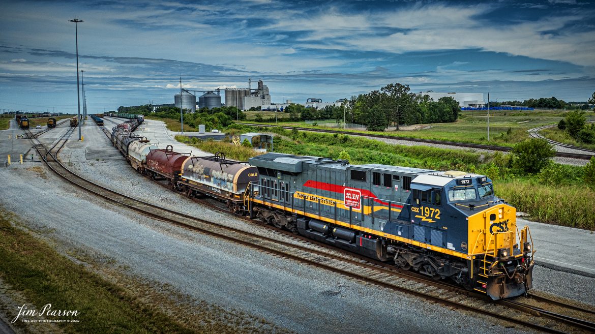 CSX M513 pulls out of the south end of Casky Yard as it continues it's run south from Hopkinsville, Kentucky, with CSX Heritage Unit L&N 1972 Family Lines System Leading, on August 16th, 2024, on the Henderson Subdivision.

According to CSXT: Our fleet of heritage locomotives is growing again as we unveil CSX Locomotive 1972, a tribute to the Family Lines System! The #ONECSX team in Waycross, GA recreated this unit to celebrate the special time from 1972-1982 when the Seaboard Coast Line, Clinchfield and L&N railroads were marketed as one. Eventually merging to become the Seaboard System Railroad, and ultimately the CSX we know today, the Family Lines System represents an integral part of our railroad’s rich history.

The CSX heritage series is reinforcing employee pride in the history of the railroad that continues to move the nation’s economy with safe, reliable, and sustainable rail-based transportation services.

Tech Info: DJI Mavic 3 Classic Drone, RAW, 22mm, f/2.8, 1/2500, ISO 100.

#railroad #railroads #train #trains #bestphoto #railroadengines #picturesoftrains #picturesofrailway #bestphotograph #photographyoftrains #trainphotography #JimPearsonPhotography #trendingphoto