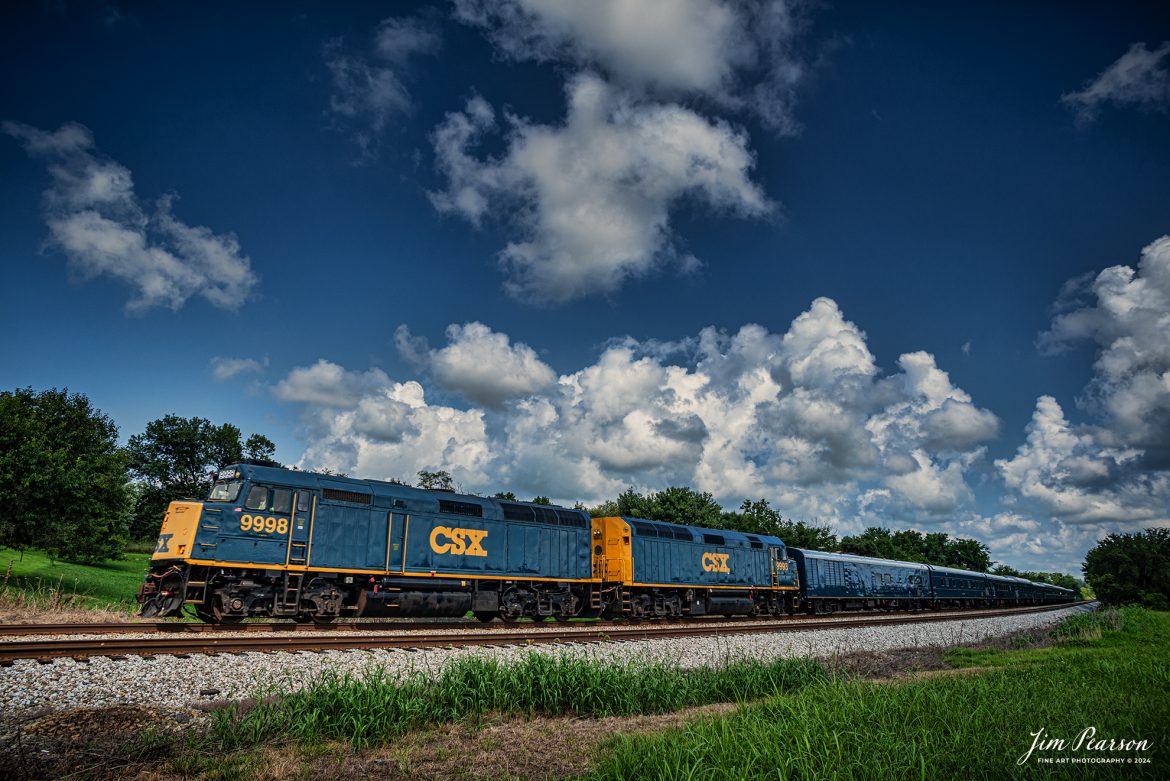 Blast from The Past – Over 20 years ago on August 19th, 2013, CSXT 9998 and 9993 led the CSX Business Train south along the Henderson Subdivision, a long time before it sported its current B&O paint scheme. Even then it was a beautiful train to photograph, and I caught it here passing the Latham Siding at Hopkinsville, Kentucky. 

Tech Info: Nikon D800, RAW, Nikon 18mm, f/18, 1/640, ISO 500.

#trainphotography #railroadphotography #trains #railways #trainphotographer #railroadphotographer #jimpearsonphotography #csxbusinesstrain #onecsx #csxt