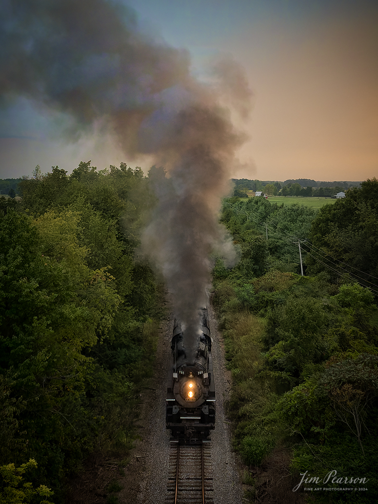 August 30th, 2024, Steam locomotive Nickel Plate 765 pulls “The Limited” through the countryside during the golden light of sunset as they make their way to Reading, Michigan as part of Indiana Rail Experience’s Rolling Victory Weekend.

According to their website: Rolling Victory was a three-day living history event celebrating American military, railroad, and home front history featuring vintage train rides, World War II reenactors, battles, a big band orchestra, and an immersive and educational experience for all ages in Pleasant Lake, Indiana.

Tech Info: DJI Mavic 3 Classic Drone, RAW, 24mm, f/2.8, 1/500, ISO 800.

#railroad #railroads #train, #trains #railway #railway #steamtrains #railtransport #railroadengines #picturesoftrains #picturesofrailways #besttrainphotograph #bestphoto #photographyoftrains #bestsoldpicture #JimPearsonPhotography #steamtrains #nkp765 #passengertrains #trainsfromtheair #trainsfromadrone