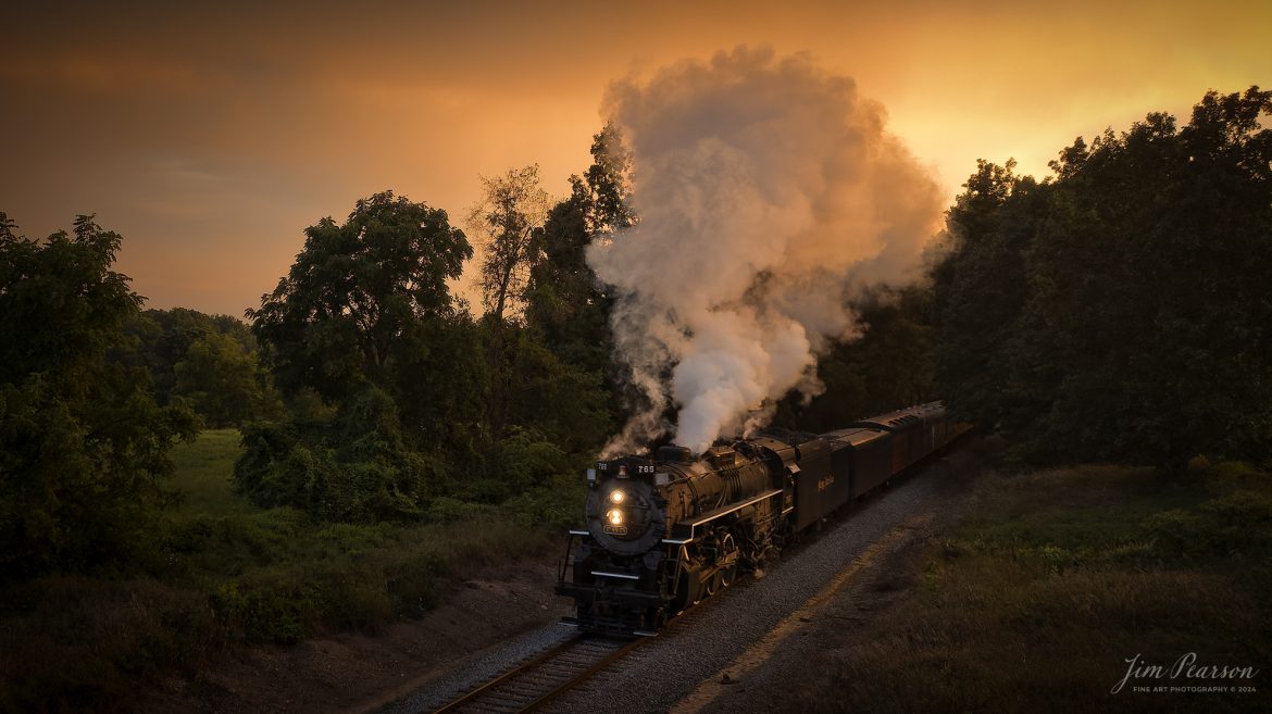 August 30th, 2024, Steam locomotive Nickel Plate 765 pulls “The Limited” through the countryside during the golden light of sunset as they make their way to Reading, Michigan as part of Indiana Rail Experience’s Rolling Victory Weekend.

According to their website: Rolling Victory was a three-day living history event celebrating American military, railroad, and home front history featuring vintage train rides, World War II reenactors, battles, a big band orchestra, and an immersive and educational experience for all ages in Pleasant Lake, Indiana.

Tech Info: DJI Mavic 3 Classic Drone, RAW, 24mm, f/2.8, 1/500, ISO 800.

#railroad #railroads #train, #trains #railway #railway #steamtrains #railtransport #railroadengines #picturesoftrains #picturesofrailways #besttrainphotograph #bestphoto #photographyoftrains #bestsoldpicture #JimPearsonPhotography #steamtrains #nkp765 #passengertrains #trainsfromtheair #trainsfromadrone