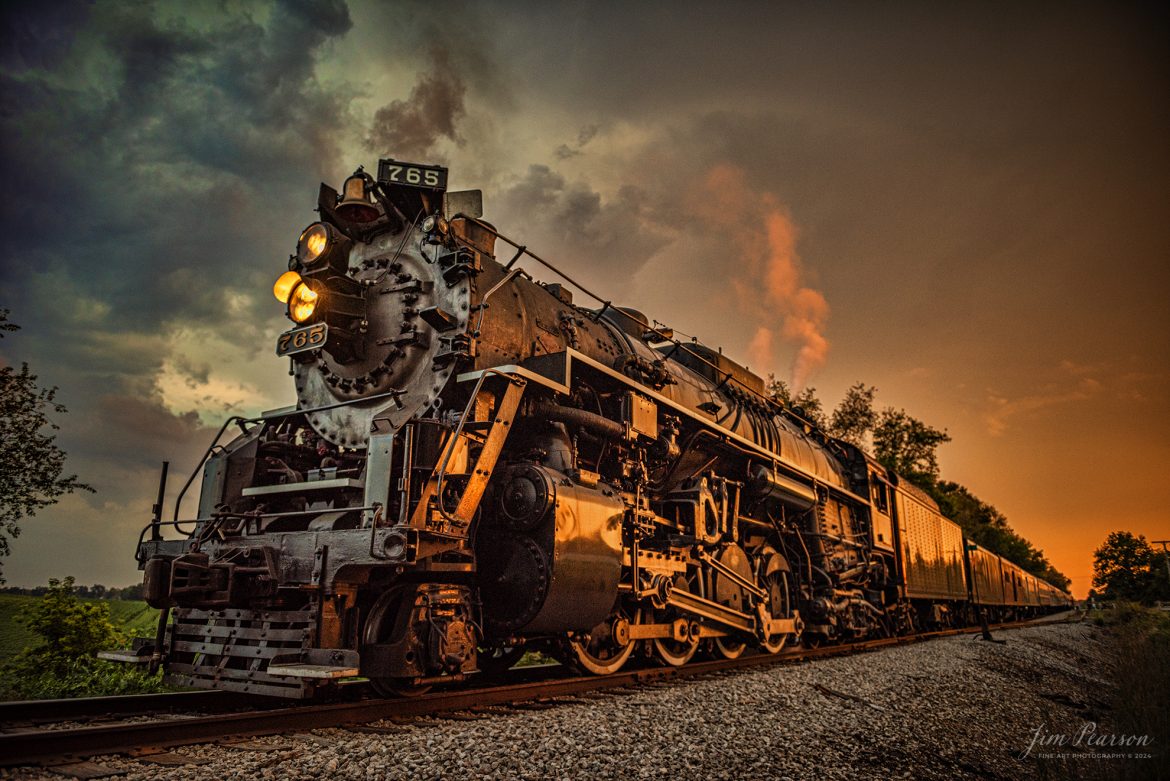 August 30th, 2024, Steam locomotive Nickel Plate 765 leads “The Limited” as they allow their passengers off the train at Ray, Indiana for a photo runby during a late evening passenger train run to Reading, Michigan, as part of Indiana Rail Experience’s Rolling Victory Weekend.

According to their website: Rolling Victory was a three-day living history event celebrating American military, railroad, and home front history featuring vintage train rides, World War II reenactors, battles, a big band orchestra, and an immersive and educational experience for all ages in Pleasant Lake, Indiana.

Tech Info: Nikon D810, RAW, Nikon 24-70 @ 24mm, f/2.8, 1/800, ISO 720.

#railroad #railroads #train, #trains #railway #railway #steamtrains #railtransport #railroadengines #picturesoftrains #picturesofrailways #besttrainphotograph #bestphoto #photographyoftrains #bestsoldpicture #JimPearsonPhotography #steamtrains #nkp765 #passengertrains