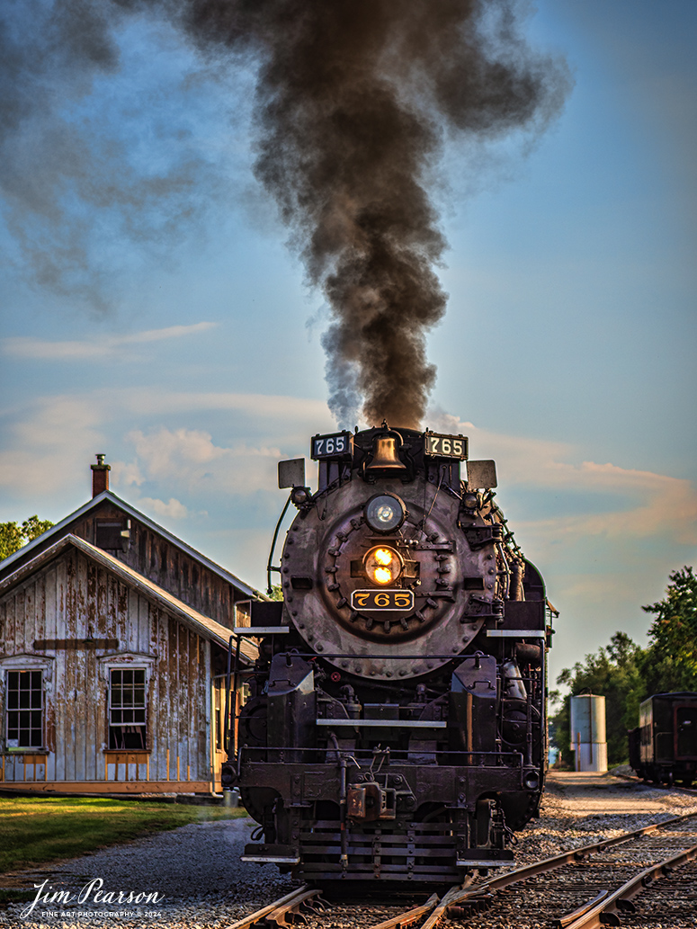 August 30th, 2024, Steam locomotive Nickel Plate 765 leads “The Limited” as it waits to depart Pleasant lake, Indiana on a late evening passenger train run to Reading, Michigan, as part of Indiana Rail Experience’s Rolling Victory Weekend.

According to their website: Rolling Victory was a three-day living history event celebrating American military, railroad, and home front history featuring vintage train rides, World War II reenactors, battles, a big band orchestra, and an immersive and educational experience for all ages in Pleasant Lake, Indiana.

Tech Info: Nikon D810, RAW, Nikon 24-70 @ 70mm, f/2.8, 1/2000, ISO 64.

#railroad #railroads #train, #trains #railway #railway #steamtrains #railtransport #railroadengines #picturesoftrains #picturesofrailways #besttrainphotograph #bestphoto #photographyoftrains #bestsoldpicture #JimPearsonPhotography #steamtrains #nkp765 #passengertrains