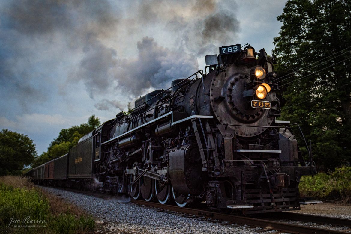 August 30th, 2024, Steam locomotive Nickel Plate 765 leads “The Limited” through the Indiana countryside, on a late evening passenger train run to Reading, Michigan, as part of Indiana Rail Experience’s Rolling Victory Weekend.

According to their website: Rolling Victory was a three-day living history event celebrating American military, railroad, and home front history featuring vintage train rides, World War II reenactors, battles, a big band orchestra, and an immersive and educational experience for all ages in Pleasant Lake, Indiana.

Tech Info: Nikon D810, RAW, Sigma 150-600 @ 420mm, f/6, 1/640, ISO 560.

#railroad #railroads #train, #trains #railway #railway #steamtrains #railtransport #railroadengines #picturesoftrains #picturesofrailways #besttrainphotograph #bestphoto #photographyoftrains #bestsoldpicture #JimPearsonPhotography #steamtrains #nkp765 #passengertrains