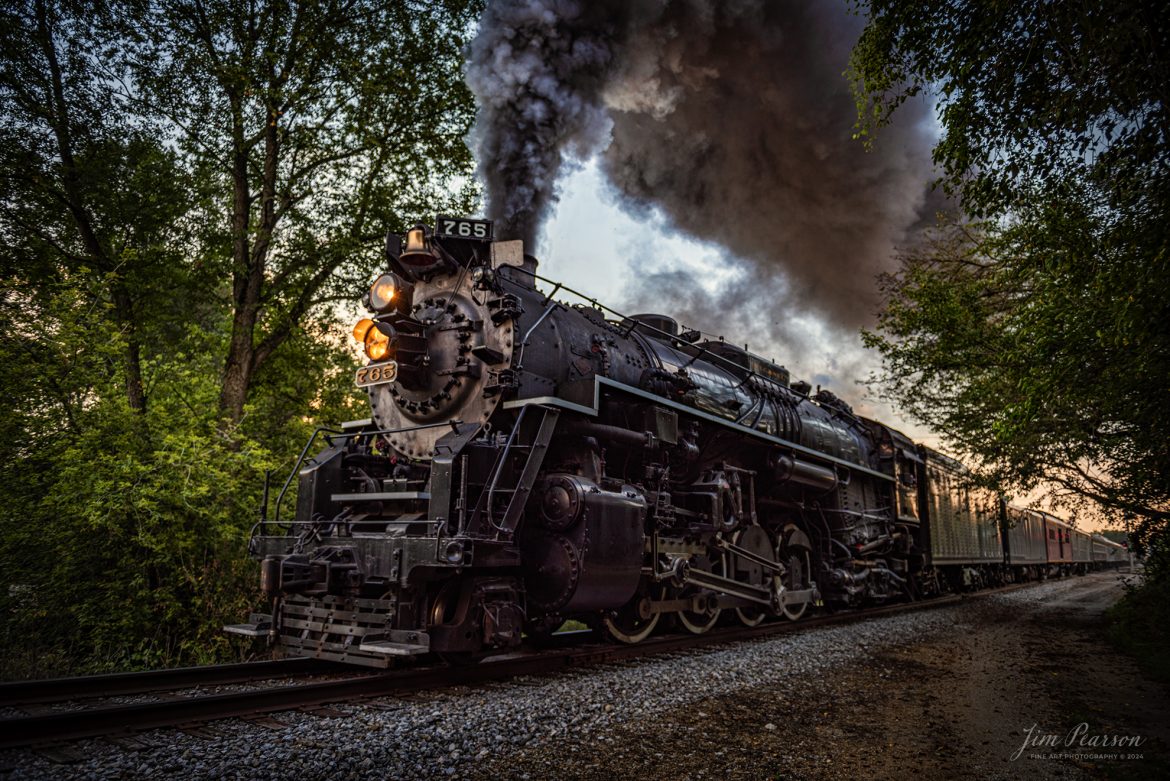 August 30th, 2024, Steam locomotive Nickel Plate 765 leads “The Limited” departs Pleasant lake, Indiana on a late evening passenger train run to Reading, Michigan, as part of Indiana Rail Experience’s Rolling Victory Weekend.

According to their website: Rolling Victory was a three-day living history event celebrating American military, railroad, and home front history featuring vintage train rides, World War II reenactors, battles, a big band orchestra, and an immersive and educational experience for all ages in Pleasant Lake, Indiana.

Tech Info: Nikon D810, RAW, Nikon 24-70 @ 24mm, f/2.8, 1/250, ISO 64.

#railroad #railroads #train, #trains #railway #railway #steamtrains #railtransport #railroadengines #picturesoftrains #picturesofrailways #besttrainphotograph #bestphoto #photographyoftrains #bestsoldpicture #JimPearsonPhotography #steamtrains #nkp765 #passengertrains