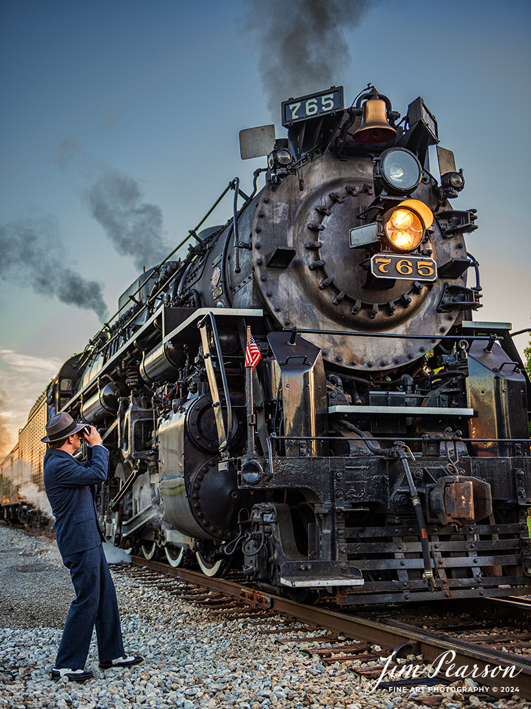 Fort Wayne Railroad Historical Society volunteer Glenn Holland poses for a photo during the evening/night photo shoot at Pleasant Lake, IN, on August 31st, 2024, as part of the Rolling Victory Weekend. 

According to their website: Rolling Victory was a three-day living history event celebrating American military, railroad, and home front history featuring vintage train rides, World War II reenactors, battles, a big band orchestra, and an immersive and educational experience for all ages in Pleasant Lake, Indiana.

Tech Info: Nikon D810, RAW, Nikon 24-70 @ 38mm, f/2.8, 1/200, ISO 320.

#railroad #railroads #train, #trains #railway #railway #steamtrains #railtransport #railroadengines #picturesoftrains #picturesofrailways #besttrainphotograph #bestphoto #photographyoftrains #bestsoldpicture #JimPearsonPhotography #steamtrains #nkp765 #passengertrains