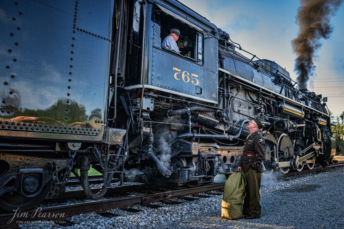 NKP 765 engineer Grant Geist talks with military reenactor Matt Martini during the evening/night photo shoot at Pleasant Lake, IN, on August 31st, 2024, during the Rolling Victory Weekend.

According to their website: Rolling Victory was a three-day living history event celebrating American military, railroad, and home front history featuring vintage train rides, World War II reenactors, battles, a big band orchestra, and an immersive and educational experience for all ages in Pleasant Lake, Indiana.

Tech Info: Nikon D810, RAW, Nikon 24-70 @ 24mm, f/6.3, 1/640, ISO 2500.

#railroad #railroads #train, #trains #railway #railway #steamtrains #railtransport #railroadengines #picturesoftrains #picturesofrailways #besttrainphotograph #bestphoto #photographyoftrains #bestsoldpicture #JimPearsonPhotography #steamtrains #nkp765 #passengertrains