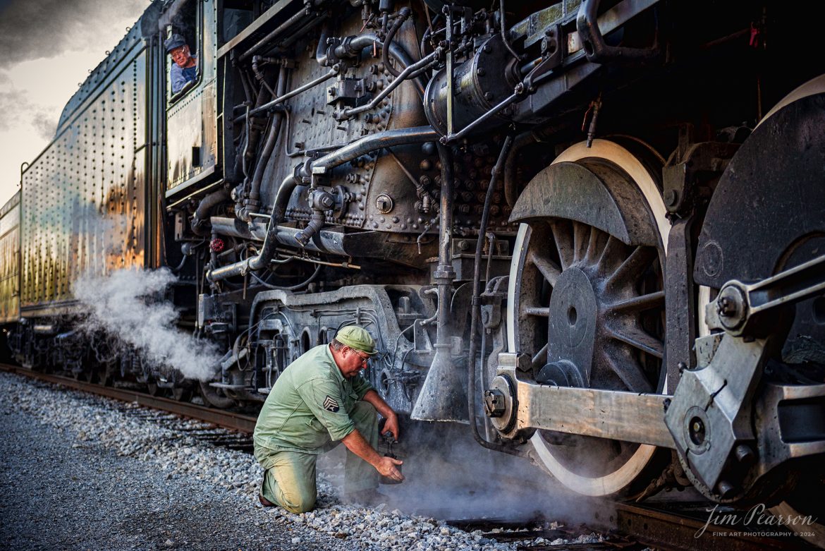 NKP 765 engineer Grant Geist talks watches as military reenactor Ken Hoelscher poses during the evening/night photo shoot at Pleasant Lake, IN, on August 31st, 2024, during the Rolling Victory Weekend. During World War II there were military crews that actually ran and maintained this locomotive, from what I’m told.

According to their website: Rolling Victory was a three-day living history event celebrating American military, railroad, and home front history featuring vintage train rides, World War II reenactors, battles, a big band orchestra, and an immersive and educational experience for all ages in Pleasant Lake, Indiana.

Tech Info: Nikon D810, RAW, Nikon 24-70 @ 24mm, f/6.3, 1/640, ISO 1100.

#railroad #railroads #train, #trains #railway #railway #steamtrains #railtransport #railroadengines #picturesoftrains #picturesofrailways #besttrainphotograph #bestphoto #photographyoftrains #bestsoldpicture #JimPearsonPhotography #steamtrains #nkp765 #passengertrains