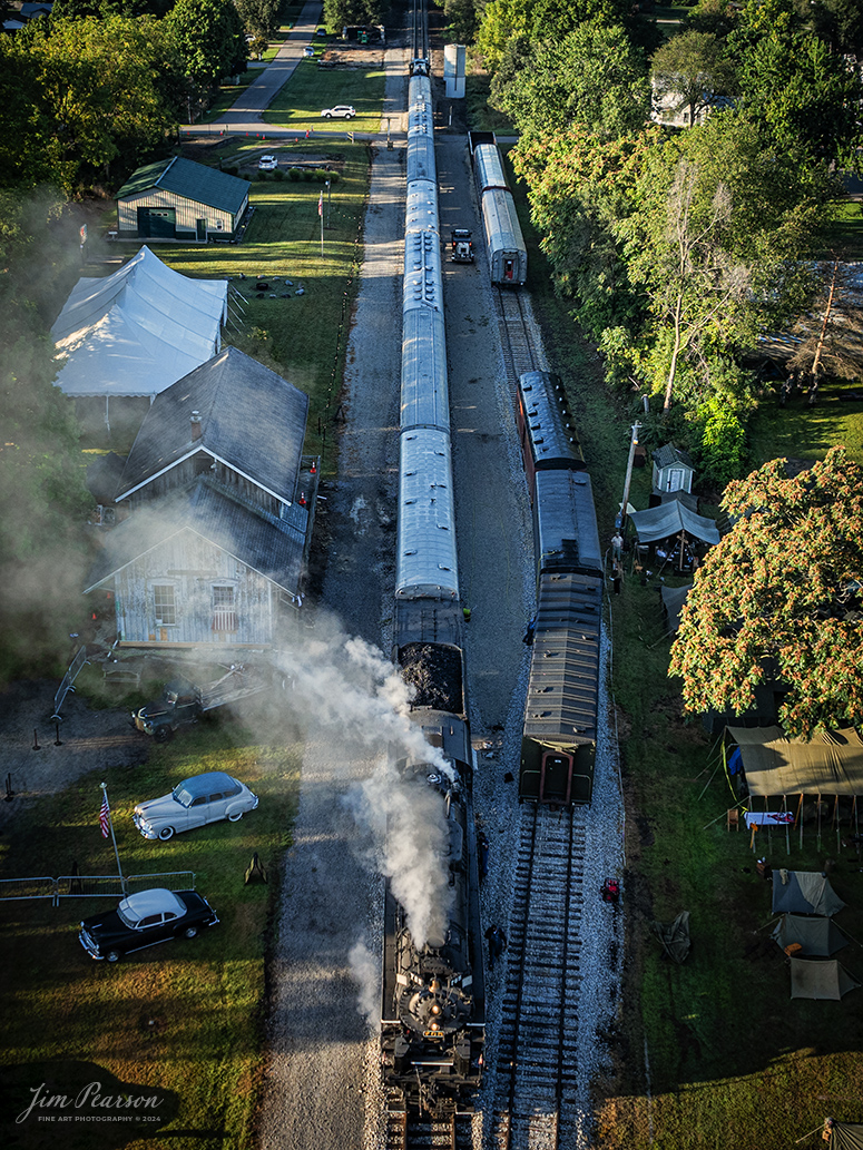 September 1st, 2024, Steam locomotive Nickel Plate 765 sits at the station in Pleasant Lake, Indiana as they prepare to head to Angola, Indiana for their first load of passengers during Indiana Rail Experience’s Rolling Victory Weekend.

According to their website: Rolling Victory was a three-day living history event celebrating American military, railroad, and home front history featuring vintage train rides, World War II reenactors, battles, a big band orchestra, and an immersive and educational experience for all ages in Pleasant Lake, Indiana.

Tech Info: DJI Mavic 3 Classic Drone, RAW, 24mm, f/2.8, 1/500, ISO 170.

#railroad #railroads #train, #trains #railway #railway #steamtrains #railtransport #railroadengines #picturesoftrains #picturesofrailways #besttrainphotograph #bestphoto #photographyoftrains #bestsoldpicture #JimPearsonPhotography #steamtrains #nkp765 #passengertrains #trainsfromtheair #trainsfromadrone