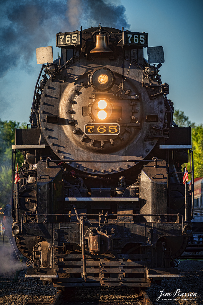 September 1st, 2024, A portrait of Steam locomotive Nickel Plate 765 at the station in Pleasant Lake, Indiana as they wait to pull their passenger train to Angola, Indiana for their first load of passengers during Indiana Rail Experience’s Rolling Victory Weekend.

According to their website: Rolling Victory was a three-day living history event celebrating American military, railroad, and home front history featuring vintage train rides, World War II reenactors, battles, a big band orchestra, and an immersive and educational experience for all ages in Pleasant Lake, Indiana.

Tech Info: Nikon D810, RAW, Sigma 150-600 @ 220mm, f/5.6, 1/1000, ISO 200.

#railroad #railroads #train, #trains #railway #railway #steamtrains #railtransport #railroadengines #picturesoftrains #picturesofrailways #besttrainphotograph #bestphoto #photographyoftrains #bestsoldpicture #JimPearsonPhotography #steamtrains #nkp765 #passengertrains