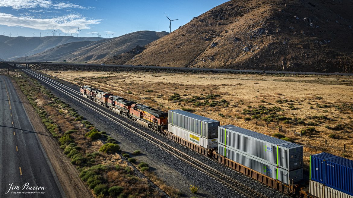 September 19th, 2024, BNSF intermodal heads north out of Tehachapi, California, on the Union Pacific Mojave Subdivision on a beautiful summer evening.

Tech Info: DJI Mavic 3 Classic Drone, RAW, 24mm, f/2.8, 1/2500, ISO 150.

#railroad #railroads #train, #trains #railway #railway #steamtrains #railtransport #railroadengines #picturesoftrains #picturesofrailways #besttrainphotograph #bestphoto #photographyoftrains #bestsoldpicture #JimPearsonPhotography #trainsfromtheair #trainsfromadrone