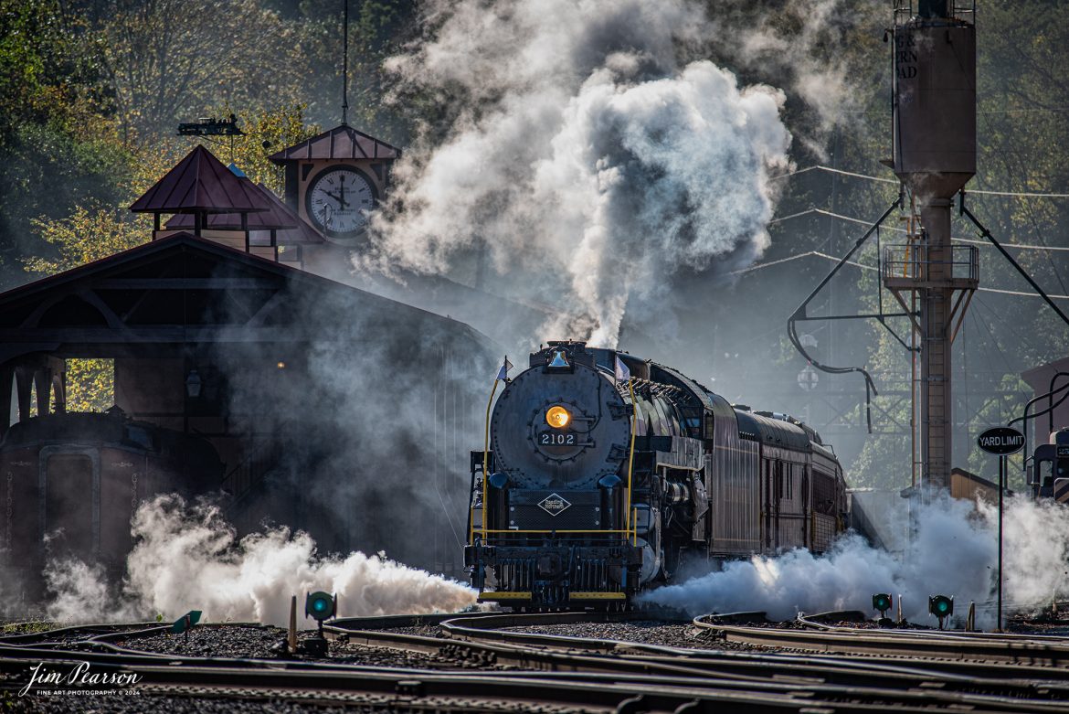 Reading Blue Mountain & Northern Railroad steam locomotive 2102 pulls away from the station at at Port Clinton, Pennsylvania on October 5th, 2024,during its first day of the year of pulling Fall Foliage Excursions.

According to their website: The Reading Company T-1 class #2102 was built in the Reading’s own locomotive shops in 1945. With drivers of 70” diameter, it weighs 404 tons, and its tender holds up to 26 tons of coal, and up to 19,000 gallons of water. After the Reading Steam era was over, the Reading Company used 2102 for the Reading Rambles on several different excursions. The 2102 has had many different owners since it was retired by the Reading Railroad. It is one of only four to survive. The other remaining locomotives are the 2100, 2101, and 2124.

The Blue Mountain and Reading Railroad purchased the 2102 in 1987, and it ran on the Temple to South Hamburg line into the early 1990’s. Once the Blue Mountain and Reading Railroad became the Reading Blue Mountain & Northern, the 2102 ran over Reading & Northern’s rails for a short time before it was removed from service in the early 1990’s. 

In 2022, steam locomotive 2102 reentered service on the Reading & Northern. The locomotive has been used actively to pull both passenger excursions and revenue freight trains.

Tech Info: Nikon D810, RAW, Nikon 70-300 @ 300mm, 5.6, 1640, ISO 200.

#steamtrains #besttrainphotograph #JimPearsonPhotography #RBNRR