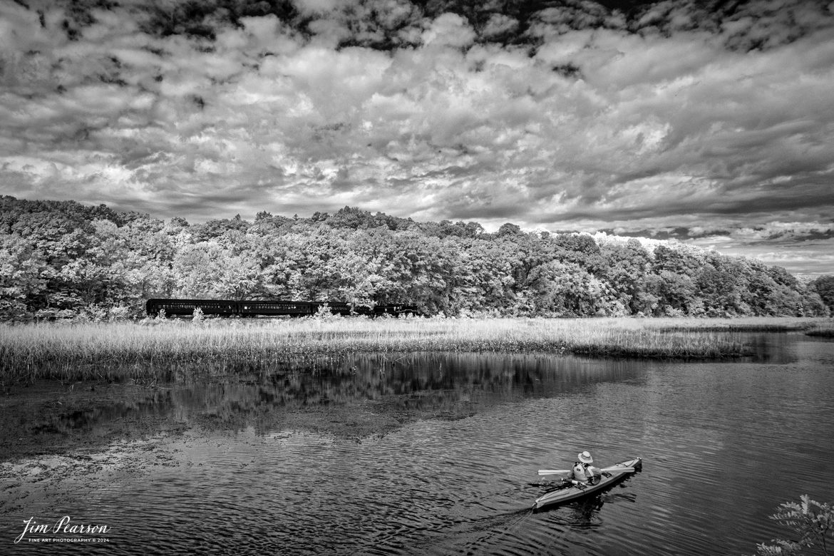 In this week’s Saturday Infrared Photo, we find The Valley Railroad Company #40 steaming along the Pratt and Post Coves Preserve as a kayaker watches from the water at Deep River, Connecticut on October 9th, 2024, as part of a two-day photo charter conducted by Dak Dillion Photography.

According to Wikipedia: The Valley Railroad, operating under the name Essex Steam Train and Riverboat, is a heritage railroad based in Connecticut on tracks of the Connecticut Valley Railroad, which was founded in 1868. The company began operations in 1971 between Deep River and Essex and has since reopened additional parts of the former Connecticut Valley Railroad line. It operates the Essex Steam Train and the Essex Clipper Dinner Train.

Valley Railroad #40 is an ALCO 2-8-0 that was built in 1923. It was built as Portland, Astoria and Pacific No. 101, but never used there; transferred to Minarets and Western Railroad in 1921, later to Southern Pacific, then to the Aberdeen and Rockfish Railroad. Purchased by the Valley Railroad in 1977.

Tech Info: Fuji XT-1, RAW, Converted to 720nm B&W IR, Nikon 10-24 @ 16mm, f/5, 1/500, ISO 400.

#jimpearsonphotography #infraredtrainphotography #infraredphotography #infraredphotography #trending #thevalleyrailroad