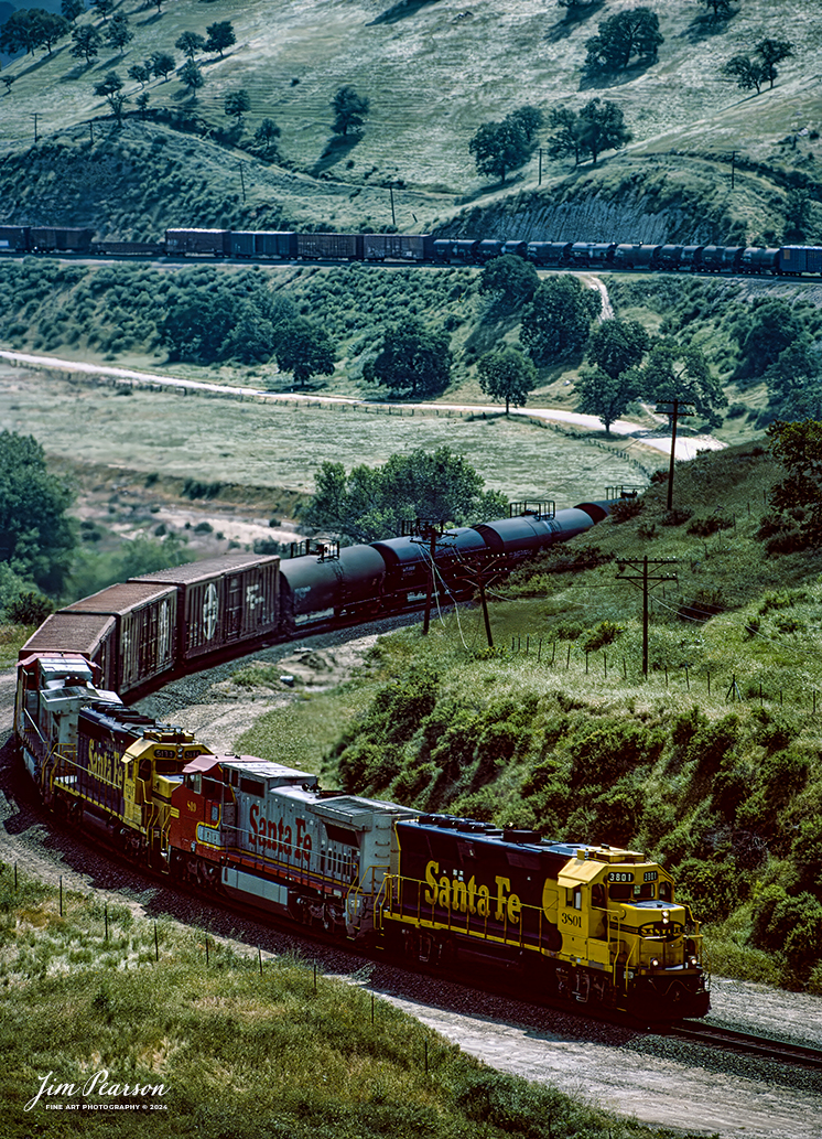 April, 1995 – Blast From The Past – SF 3801 leads a southbound train about to enter tunnel one on the way to Bealville, California, as they make their way through the Tehachapi Mountains on the UP Mojave Subdivision toward Bakersfield, CA.

Thinking of visiting this area? Check out this page on the web!
http://www.trainweb.org/brettrw/maps/caliente.htm

Tech Info: Nikon D200, Nikon 70-300 @300mm, Ektachrome Slide Film, 1/2000, f/5.6, ISO 100.