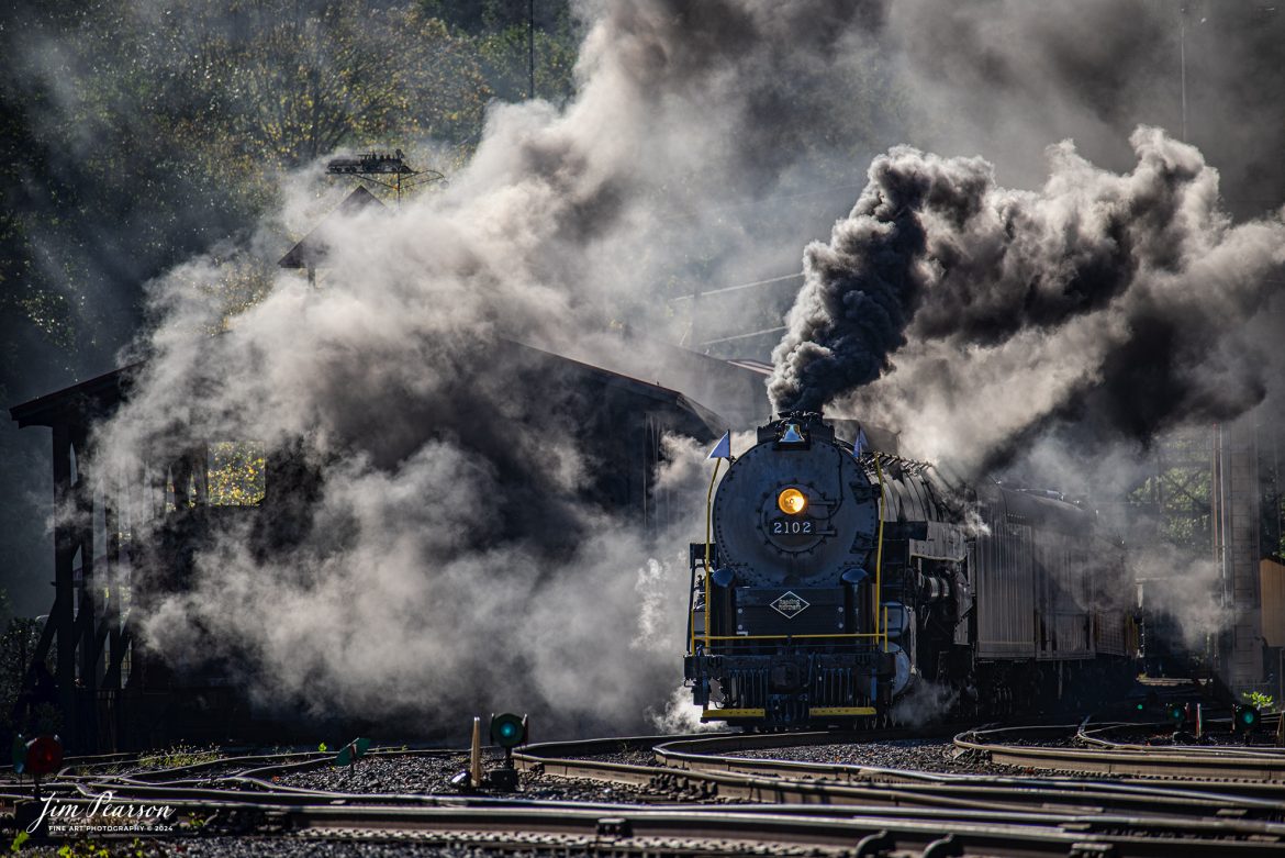 Reading Blue Mountain & Northern Railroad steam locomotive 2102 sits at the station at at Port Clinton, Pennsylvania on October 5th, 2024,during its first day of the year of pulling Fall Foliage Excursions.

According to their website: The Reading Company T-1 class #2102 was built in the Reading’s own locomotive shops in 1945. With drivers of 70” diameter, it weighs 404 tons, and its tender holds up to 26 tons of coal, and up to 19,000 gallons of water. After the Reading Steam era was over, the Reading Company used 2102 for the Reading Rambles on several different excursions. The 2102 has had many different owners since it was retired by the Reading Railroad. It is one of only four to survive. The other remaining locomotives are the 2100, 2101, and 2124.

The Blue Mountain and Reading Railroad purchased the 2102 in 1987, and it ran on the Temple to South Hamburg line into the early 1990’s. Once the Blue Mountain and Reading Railroad became the Reading Blue Mountain & Northern, the 2102 ran over Reading & Northern’s rails for a short time before it was removed from service in the early 1990’s. 

In 2022, steam locomotive 2102 reentered service on the Reading & Northern. The locomotive has been used actively to pull both passenger excursions and revenue freight trains.

Tech Info: Nikon D810, RAW, Nikon 70-300 @ 300mm, f/5.6, 1640, ISO 180.

#steamtrains #besttrainphotograph #JimPearsonPhotography #RBNRR