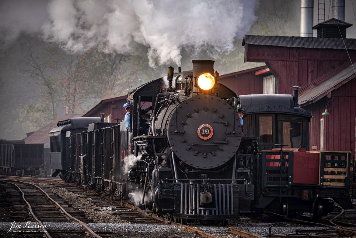 East Broad Top (EBT) steam locomotive #16 pulls a mixed freight as the engineer and conductor keep an eye on the track ahead, as they head through the yard at Rockhill Furnace, Pennsylvania on October 6th, 2024, during the museum’s Friends of the East Broad top event.

According to the East Broad Top Website: Locomotive #16 was built in 1916 by the Baldwin Locomotive Works.

Entering the age of modern steam in 1916, the EBT received its first of three large Mikados. Unlike the previous three smaller locomotives, #16 came with superheaters, piston valves, and Southern valve gear. One story mentions #16 pulled 60 empty hoppers from Mt. Union to Rockhill in one train, literally clearing out the yard. #16 underwent an overhaul in 1955 and made only a handful of trips in early 1956 before the railroad shut down. On February 1, 2023, the locomotive returned to service.

Tech Info: Nikon D810, RAW, Nikon 70-300 @185mm, f/5.3, 1/400, ISO 250.

steam locomotive, train, railways, vintage, smoke, green hillside, sunlight, iron bridge, transportation, travel, photography of trains, train photography, Jim Pearson Photography, trending photo, East Broad Top Railroad, steam train