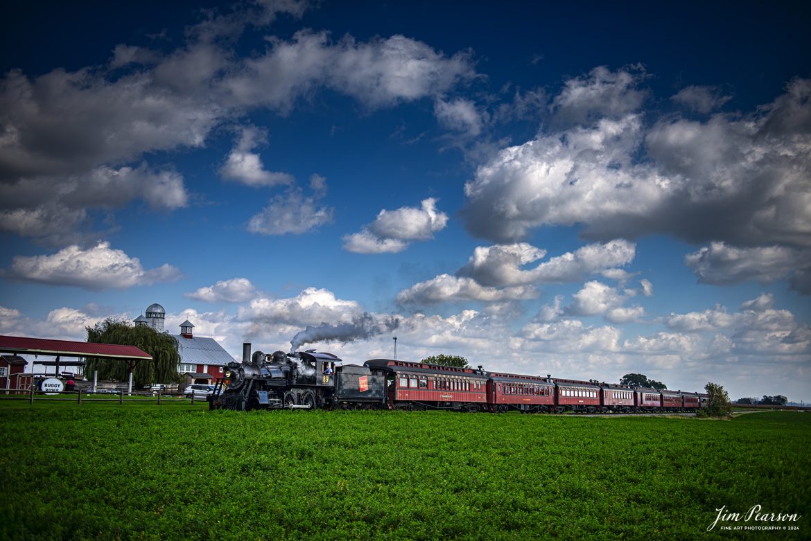 Canadian National 89 passes the Red Caboose Motel as they make their way back to the station at Strasburg, Pennsylvania on October 7th, 2024, with their passenger train.

According to Wikipedia: The Strasburg Rail Road (reporting mark SRC) is a heritage railroad and the oldest continuously operating standard-gauge railroad in the western hemisphere, as well as the oldest public utility in the Commonwealth of Pennsylvania. Chartered in 1832, the Strasburg Rail Road Company is today a heritage railroad offering excursion trains hauled by steam locomotives on 4.02 mi of track in Pennsylvania Dutch Country, as well as providing contract railroad mechanical services, and freight service to area shippers. The railroad's headquarters are at Strasburg, Pennsylvania.

Tech Info: Nikon D810, RAW, Nikon 24-70 @ 52mm, 2.8, 1/1600, ISO 64.

#railroad #railroads #train, #trains #railway #railway #steamtrains #railtransport #railroadengines #picturesoftrains #picturesofrailways #besttrainphotograph #bestphoto #photographyoftrains #bestsoldpicture #JimPearsonPhotography #StrasburgRailroad