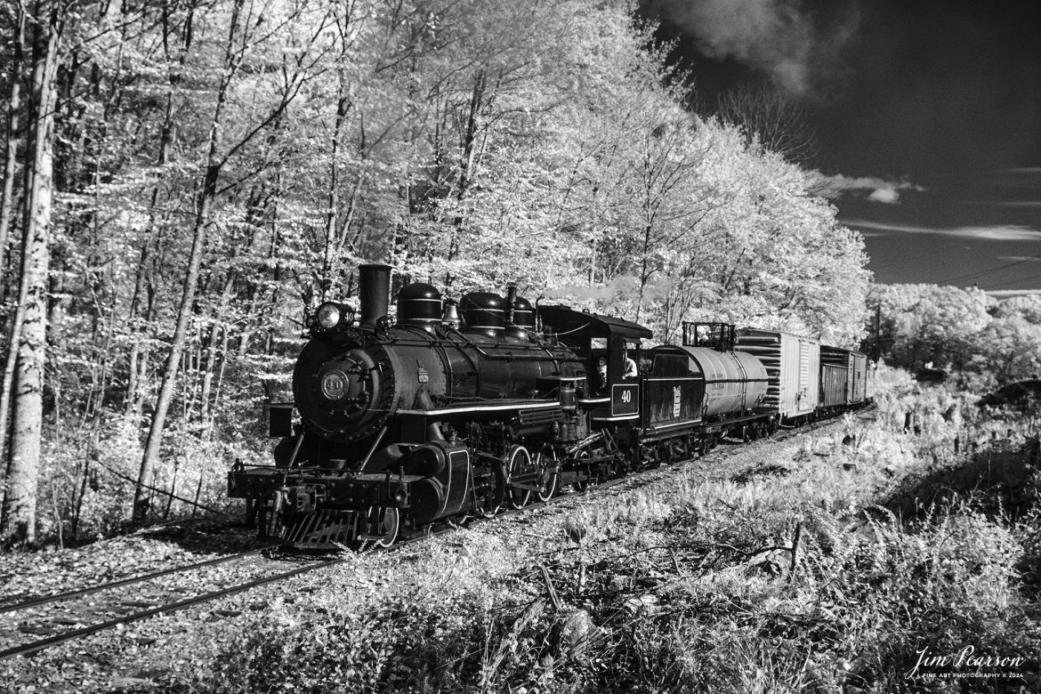 In this week’s Saturday Infrared Photo, we find The Valley Railroad Company #40 steaming through the the area referred to as "the ladder" by the railroad, with a rare mixed freight move out of Essex, Connecticut on October 8th, 2024, as part of a two-day photo charter conducted by Dak Dillion Photography. 

This section of trackage isn't normally seen on the railroad's regular operation as it's south of the depot.

According to Wikipedia: The Valley Railroad, operating under the name Essex Steam Train and Riverboat, is a heritage railroad based in Connecticut on tracks of the Connecticut Valley Railroad, which was founded in 1868. The company began operations in 1971 between Deep River and Essex and has since reopened additional parts of the former Connecticut Valley Railroad line. It operates the Essex Steam Train and the Essex Clipper Dinner Train.

Valley Railroad #40 is a ALCO 2-8-0 that was built in 1923. It was built as Portland, Astoria and Pacific No. 101, but never used there; transferred to Minarets and Western Railroad in 1921, later to Southern Pacific, then to the Aberdeen and Rockfish Railroad. Purchased by the Valley Railroad in 1977.

Tech Info: Fuji XT-1, RAW, Converted to 720nm B&W IR, Nikon 10-24 @ 24mm, f/5, 1/1000, ISO 400.

#jimpearsonphotography #infraredtrainphotography #infraredphotography #infraredphotography #trending #thevalleyrailroad