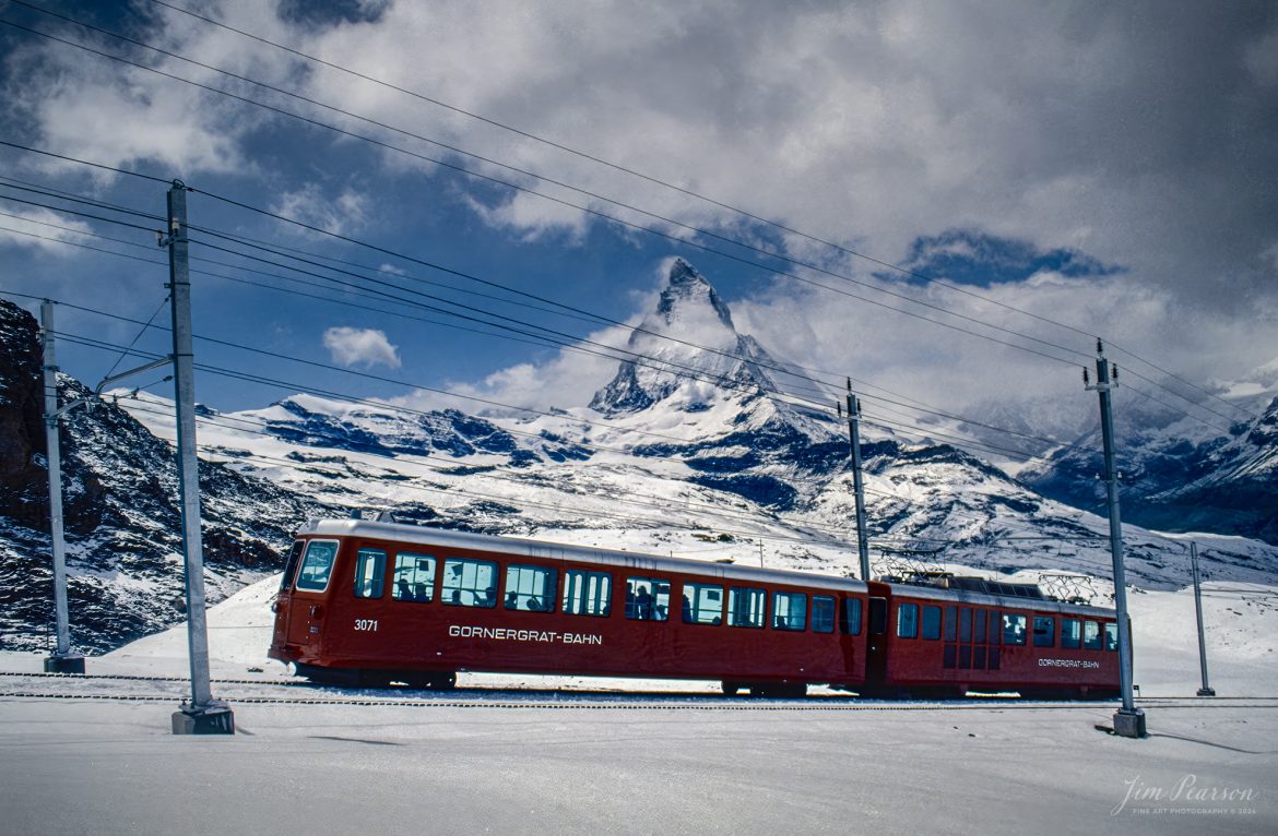 Gornergrat-Bahn 3071 leads an uphill train as the Matterhorn rises above the line as the two car Cog Railway trainset heads to Bergstation at Gornergrat from Zermatt, Switzerland. Gornergrat Station is the end of the line for the Gornergrat trains and is 3,089 meters above sea level. The base station of the Gornergrat Railway is located very close to Zermatt's train station

For a while I was the non-commissioned officer in charge of the Air Force’s Electronic Imaging Center stationed at Aviano, Italy, where Combat Camera was tasked to document the Provide Hope operation in 1992. 

I was there for six months, and on most weekends, we had time off and on one of them I took a couple days of vacation and took trains from Italy to Switzerland to ride and photograph this train line. It was probably one of my most memorable trips from my railfanning past!

According to Wikipedia:  Operation Provide Hope was a humanitarian operation conducted by the U.S. Air Force to provide medical equipment to former Soviet republics during their transition to capitalism. The operation was announced by Secretary of State James A. Baker, III on January 22–23, 1992 and the initial shipment of supplies was sent on February 10, 1992. Twelve US Air Force C-5 and C-141 was carrying an estimated 500 tons of bulk-food rations and medicines into Moscow, St. Petersburg, Kyiv, Minsk, and Chisinau from Germany and Yerevan, Almaty, Dushanbe, Ashkhabad, Baku, Tashkent, and Bishkek from Turkey. 

In total, for nearly two weeks sixty-five missions flew 2,363 short tons (2,144 t) of food and medical supplies to 24 locations in the Commonwealth of Independent States during the initial phase of operation. Much of these supplies was left over from the buildup to the Persian Gulf War.

Tech Info: Nikon F3, Nikon 80-200 @ 200mm, Ektachrome Slide Film

#trainphotography #railroadphotography #trains #railways #jimpearsonphotography #trainphotographer #railroadphotographer #Zermatt # Gornergrat-Bahn #switzerland