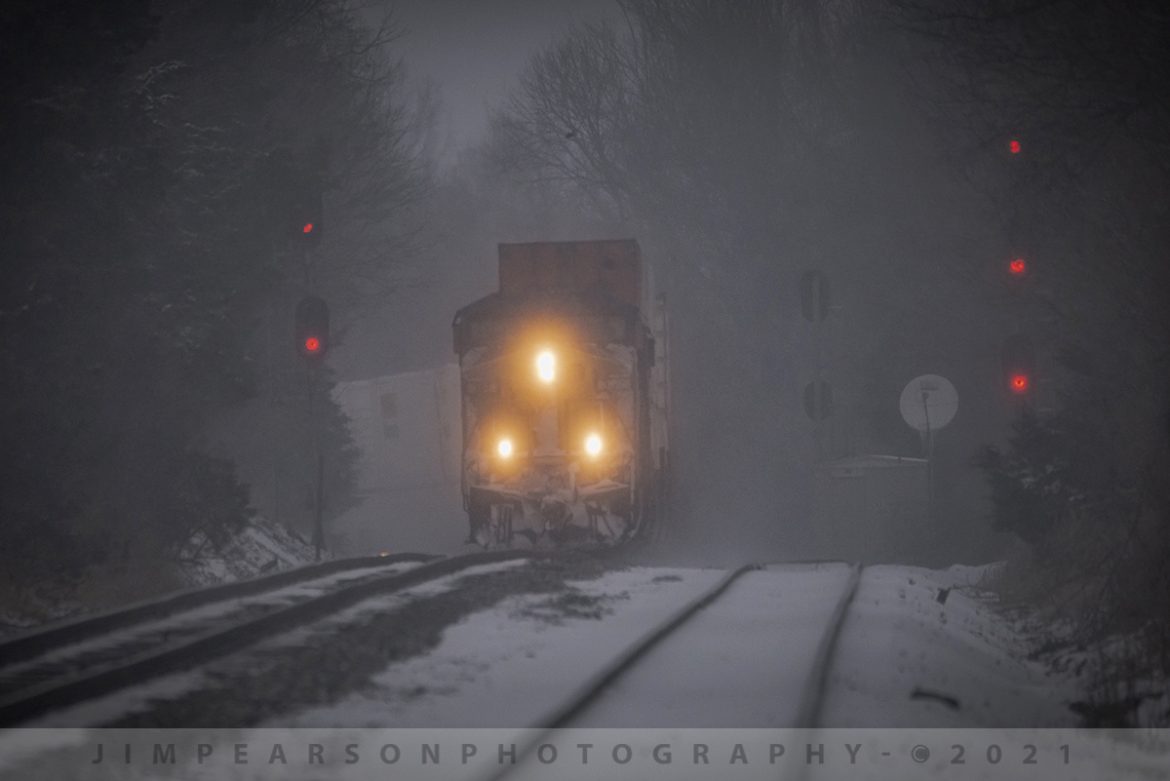 Clear north end of Hanson... well, kinda, sorta!!

CSXT 307 leads intermodal Q025 southbound through the blowing and falling snow as it passes the north end of the siding at Hanson, Kentucky on the Henderson Subdivision, on February 17th, 2021.

Q025 normally is a morning train out of Chicago, bound for Florida, but with the artic type weather that has been passing through the north and southeast, trains aren't exactly running on time! Here it's almost dark by the time it crests the rise in the blowing cold at Hanson.

#trainphotography #railroadphotography #trains #railways #jimpearsonphotography 

Tech Info: Nikon D800, RAW, Sigma 150-600 w/1.4 teleconverter @ 800mm f/9, 1/1250, ISO 1800 -0.7 Exp. Comp (helps with the highlights).