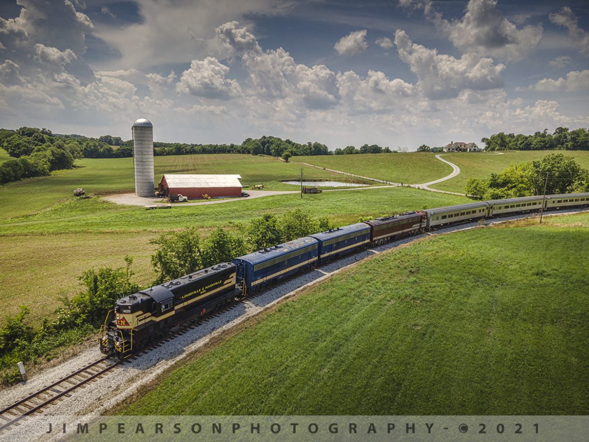 Tennessee Moonshine Sippin' Excursion Train

Today was my first time chasing the Tennessee Moonshine Sippin' Excursion Train train from the Tennessee Central Railway Museum (TCRX), which operates out of Nashville, TN on June 12th, 2021. While it was a hot and muggy day, myself and fellow railfan Ryan Scott, of Steelrails, had a great time chasing this train from Nashville to Watertown, TN and back, along the Nashville, and Eastern Railway line. Once restoration is complete Nashville Steam's Nashville, Chattanooga & St. Louis Railway steam locomotive No. 576 will lead trains along this same route!

Here Louisville and Nashville #405 (GP7 405) lead the Tennessee Moonshine Sippin' Excursion Train through the curve at Cherry Valley, TN as they approach their turn-around point of Watertown, TN on the Nashville & Eastern railway with, L&N' F7B 715 & 719, plus TCRX E8A 6902 trailing.

According to their website: The Tennessee Central Railway Museum is a volunteer, non-profit organization. Our mission is to preserve, restore, interpret, and operate historic railroad equipment to educate our guests about America's railroads.

We have a growing collection of historic equipment, but TCRM is much more than a static museum. Our specialty is operating historic trains, providing a unique opportunity to rediscover vintage rail travel through beautiful Middle Tennessee.

Since 1989, TCRM has been running passenger excursions from Nashville to points east such as Lebanon, Watertown, Baxter, Cookeville, and Monterey, Tennessee. 

#trainphotography #railroadphotography #trains #railways #dronephotography #jimpearsonphotography 

Tech Info: DJI Mavic Air 2 Drone, RAW, 4.5mm (24mm equivalent lens) f/2.8, 1/1000, ISO 100.