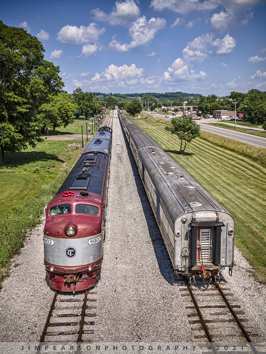 Tennessee Central 6902 runs around its train at Watertown, TN

This was my first time chasing the Tennessee Moonshine Sippin Excursion Train from the Tennessee Central Railway Museum (TCRX), which operates out of Nashville, TN, on June 12th, 2021. While it was a hot and muggy day, me and fellow railfan Ryan Scott, of Steelrails, had a great time chasing this train from Nashville to Watertown, TN and back, along the Nashville, and Eastern Railway line. 

Here Tennessee Central Railway Museums E8 unit, 6902 runs around its train at Watertown in preparation for their return trip to Nashville.

According to their website: EMD E8 6902 was built as New York Central 4084 in 1953. This unit wouldve been at the head end of many name trains of the Centrals Great Steel Fleet; including the 20th Century Limited, the Empire State Express, and the Ohio State Limited, among others. The E8 (termed DPA-5e by NYC) would serve in passenger service through the Penn Central merger, and commuter service for New Jersey Transit, before settling down at the New Georgia Railroad in 1992. When the latter operation folded, a museum member purchased this unit for use on the Broadway Dinner Train, which prompted the silver and maroon colors worn today.

Since 1989, TCRM has been running passenger excursions from Nashville to points east such as Lebanon, Watertown, Baxter, Cookeville, and Monterey, Tennessee. 

Tech Info: DJI Mavic Air 2 Drone, RAW, 4.5mm (24mm equivalent lens) f/2.8, 1/1000, ISO 100.

#trainphotography #railroadphotography #trains #railways #dronephotography #jimpearsonphotography