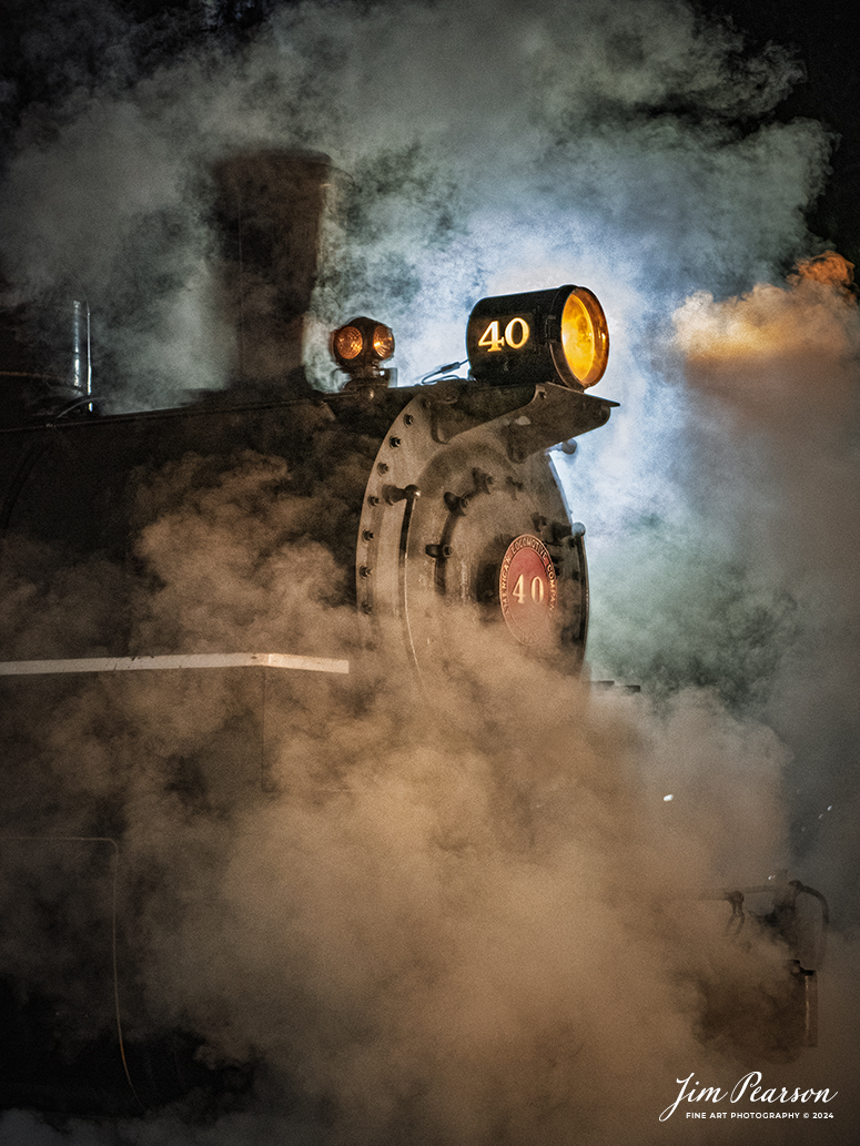 The Valley Railroad Company #40 sits in s shroud of steam at the depot at Essex, Connecticut, on the night of October 8th, 2024, during a photo charter conducted by Dak Dillion Photography.

According to Wikipedia: The Valley Railroad, operating under the name Essex Steam Train and Riverboat, is a heritage railroad based in Connecticut on tracks of the Connecticut Valley Railroad, which was founded in 1868. The company began operations in 1971 between Deep River and Essex and has since reopened additional parts of the former Connecticut Valley Railroad line. It operates the Essex Steam Train and the Essex Clipper Dinner Train.

Tech Info: Nikon D810, RAW, Nikon 24-70 @ 70mm, 2.8, 1/100, ISO 10,000.

#photographyoftrains #bestsoldpicture #JimPearsonPhotography #thevalleyrailroad #steamtrains