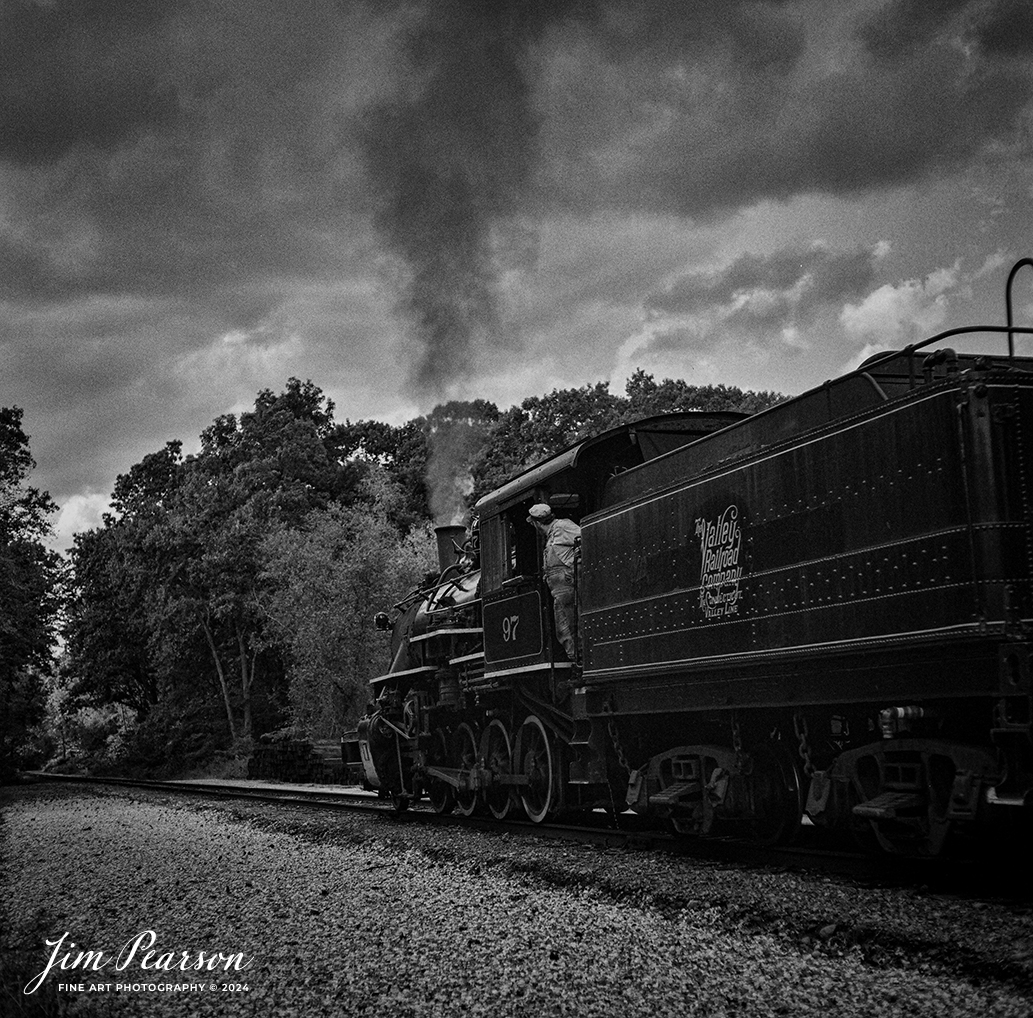 Film Wednesday – October 9th, 2024, The Valley Railroad Company steam engine #97 heads out of Essex, Connecticut as the fireman keeps a watchful eye on the track ahead, during a Dak Dillon Photography photo charter.

According to Wikipedia: The Valley Railroad, operating under the name Essex Steam Train and Riverboat, is a heritage railroad based in Connecticut on tracks of the Connecticut Valley Railroad, which was founded in 1868. The company began operations in 1971 between Deep River and Essex and has since reopened additional parts of the former Connecticut Valley Railroad line. It operates the Essex Steam Train and the Essex Clipper Dinner Train.

Valley Railroad No. 97 is a preserved 2-8-0 steam locomotive that was built in 1923 by the American Locomotive Company's Cooke Works.

Tech Info: Mamiya C330 Professional, Ilford HP5 Film, Mamiya 80mm, f/5.6, 1/400, ISO 400.

#JimPearsonPhotography #filmphotography #blackandwhite #filmphotography