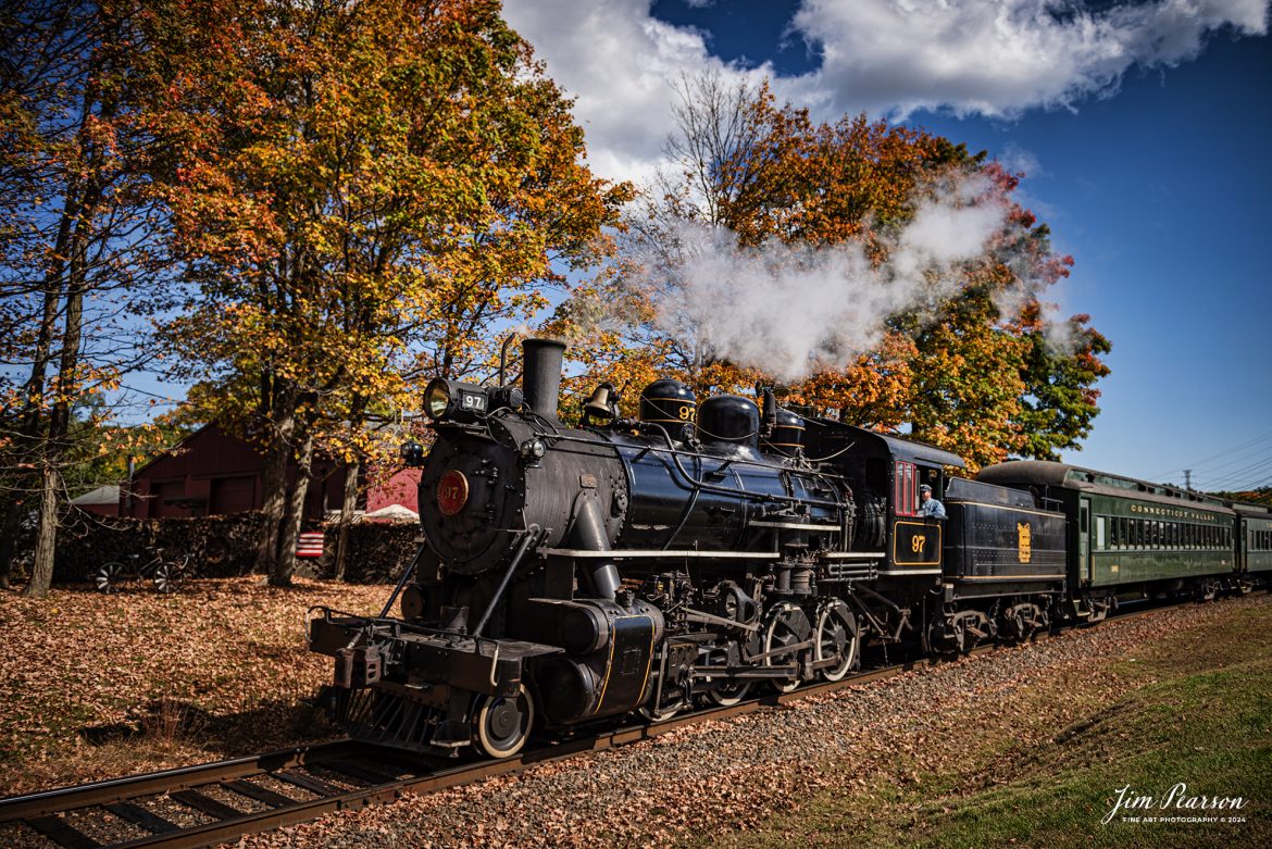 The Valley Railroad Company #97 departs from Essex, Connecticut with a passenger train on October 9th, 2024, as part of a two-day photo charter conducted by Dak Dillion Photography.

According to Wikipedia: The Valley Railroad, operating under the name Essex Steam Train and Riverboat, is a heritage railroad based in Connecticut on tracks of the Connecticut Valley Railroad, which was founded in 1868. The company began operations in 1971 between Deep River and Essex and has since reopened additional parts of the former Connecticut Valley Railroad line. It operates the Essex Steam Train and the Essex Clipper Dinner Train.

Tech Info: Nikon D810, RAW, Nikon 24-70 @ 24mm, f/3.5, 1/3200, ISO 64.

#photographyoftrains #trainphotography #JimPearsonPhotography #trendingphoto #thevalleyroadcompany