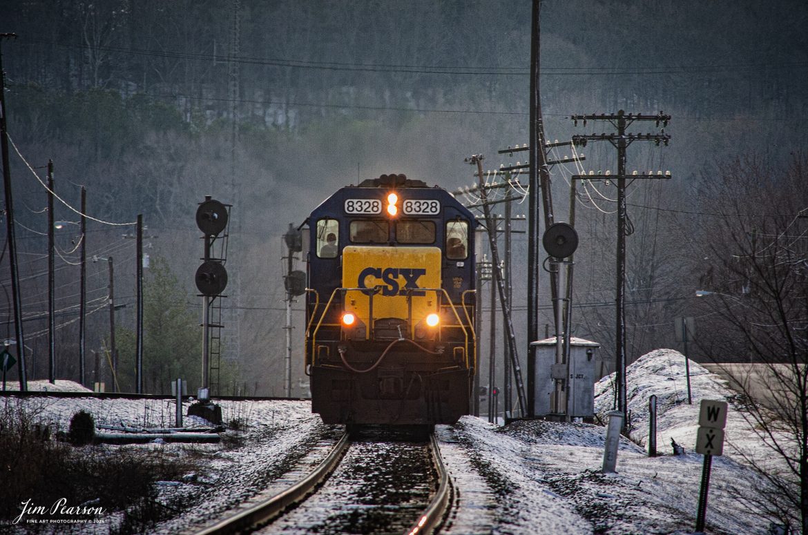 January 14th, 2006 – CSXT 8328 leads Q584 northbound freight as it crests the hump at Mortons Junction in Mortons Gap, Kentucky on the CSX Henderson Subdivision.

Tech Info: Nikon D2H, RAW, Nikon 70-300 @ 300mm, f/11, 1/320, ISO 250.

#railroad #railroads #train, #trains #railway #railway #steamtrains #railtransport #railroadengines #picturesoftrains #picturesofrailways #besttrainphotograph #bestphoto #photographyoftrains #bestsoldpicture #JimPearsonPhotography