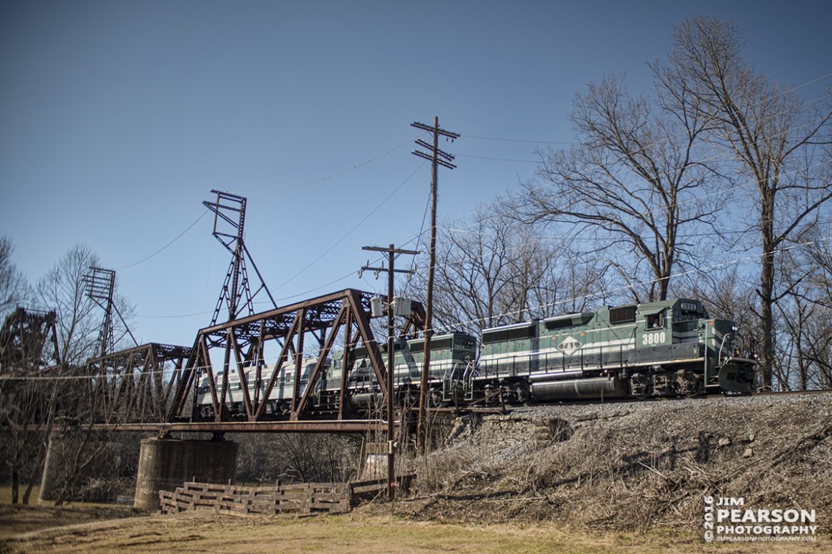 January 30, 2016 - Paducah and Louisville Railway's 3800 and 3804 head north across the lift bridge at Rockport, Ky, with PAL's business car, Bluegrass State 1 trailing behind it, on it's way to Louisville, Ky. - Tech Info: 1/2000 | f/2.8 | ISO 100 | -1 stop | Lens: Sigma 24-70 @ 24mm with a Nikon D800 shot and processed in RAW.