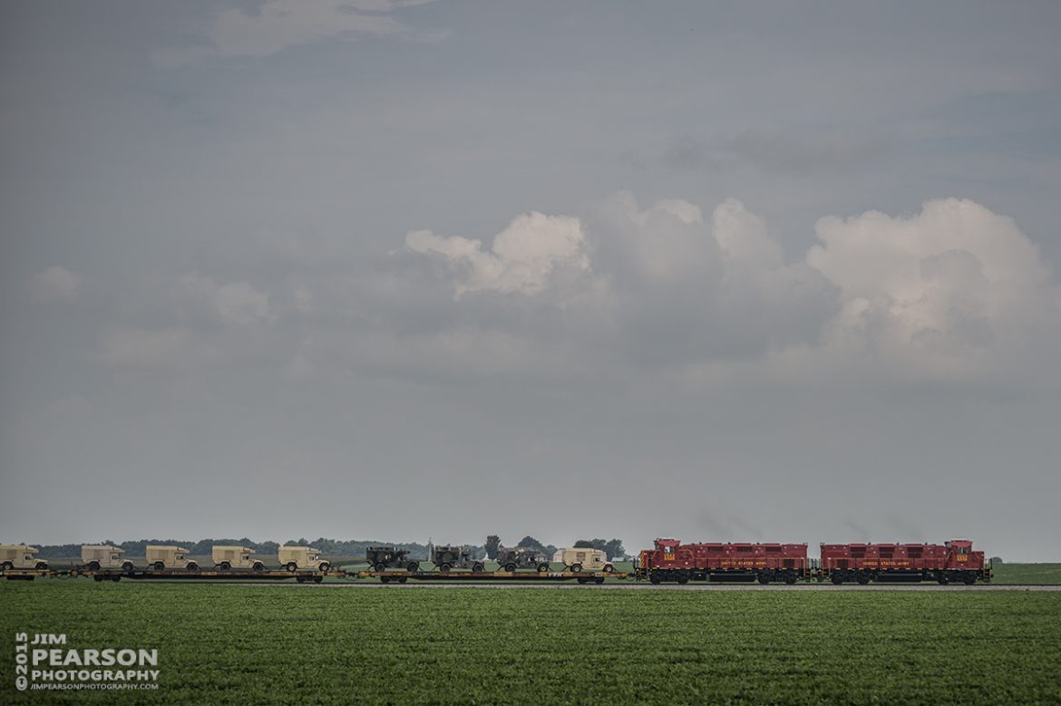 July 27, 2015 - United States Army GenSets 6519 and 6520 head through an open field along highway 41A, as they move a loaded military train from Ft. Campbell Army Post to CSX's Fort Campbell Wye in Hopkinsville, Ky. There CSX picked up the train and took it on north on the Henderson Subdivision. 

Tech Info: 1/2000sec, f/4.5, ISO 160, Lens: Nikon 70-300 @ 82mm with a Nikon D800 shot and processed in RAW.

#photographyoftrains #trainphotography #JimPearsonPhotography #trendingphoto #militarytrains