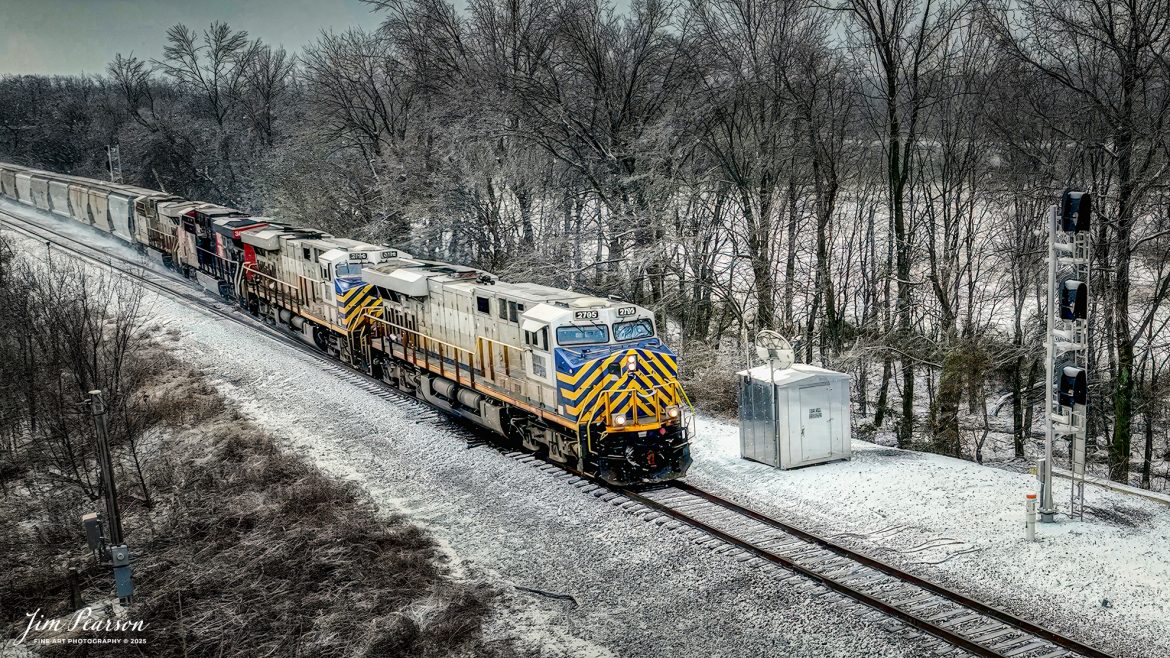 CSX B210 pulls onto the main at Oak Hill, just south of Mortons Gap, Ky with CN 2786, an ex-CitiRail unit leads with two more CitiRail and a CN unit leading their empty Phosphate train north on January 8th, 2025, on the CSX Henderson Subdivision.

Tech Info: DJI Mavic 3 Classic Drone, RAW, 22mm, f/2.8, 1/1000, ISO 100.

#trainphotography #railroadphotography #trains #railways #trainphotographer #railroadphotographer #jimpearsonphotography #trainsinthesnow