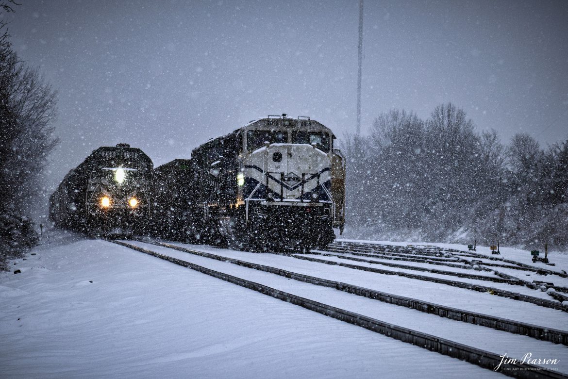 Paducah and Louisville Railway 2104 leads a southbound local as they pass PAL 2012 in the siding with a empty coal train at West Yard, Madisonville, Ky, on a cold, snowy winter day.

Tech Info: Nikon 810, RAW, Nikon 24-70 @ 70mm, f/2.8, 1/3200, ISO 100.

#railroad #railroads #train, #trains #railway #railway #steamtrains #railtransport #railroadengines #picturesoftrains #picturesofrailways #besttrainphotograph #bestphoto #photographyoftrains #bestsoldpicture #JimPearsonPhotography #PaducahandLouisvilleRailway