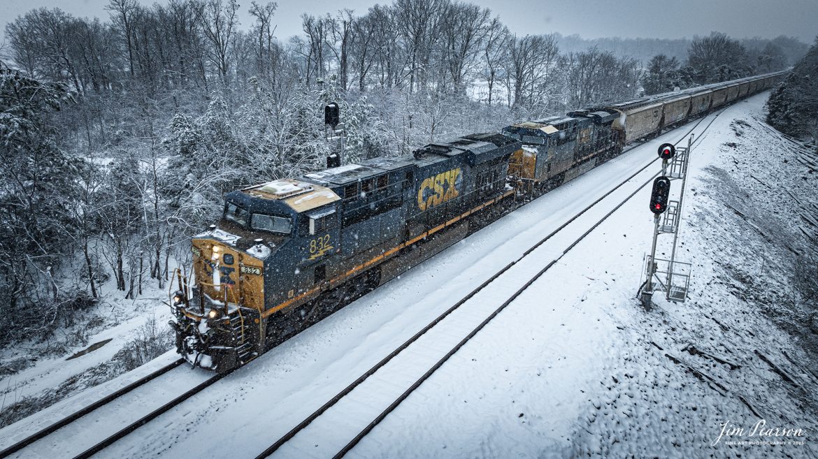 CSXT 832 leads loaded coal train G437 southbound as they split the signals at the north end of the siding at Kelly, Kentucky on January 10th, 2024.

Tech Info: DJI Mavic 3 Classic Drone, RAW, 22mm, f/2.8, 1/400, ISO 100.

#trainphotography #railroadphotography #trains #railways #trainphotographer #railroadphotographer #jimpearsonphotography #PaducahandLouisvilleRailway #trainsinthesnow