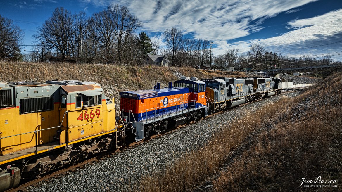 CSX M513 approaches the New Salem Circle overpass at  Nortonville, Kentucky, on January 17th, 2025, as they head south on the Henderson Subdivision.

M513 has PCS Group Switcher 1144 as the third unit and an ex-Union Pacific 4669 with reporting marks of SPTX stenciled on the side of the cab, with both units dead in tow.

According to their website, “PSC Group provides turnkey solutions for safe and efficient rail switching in some of the most challenging and complex sites throughout North America. We manage more than 75 rail switching sites using our own fleet of advanced locomotives and mobile railcar movers, proven safety methods, and highly skilled personnel. By working closely with our customers, we tailor our services to their unique needs, utilizing over 80 locomotives, 30 mobile railcar movers (Trackmobiles and Shuttle Wagons), and more than 1,000 skilled employees to enhance safety, decrease cycle time, prevent derailments, and optimize railcar utilization.

Over the years, we have found that performing railcar switching alongside loading/unloading, railcar repair, and inspections, creates a safer and more efficient operating environment while simultaneously delivering considerable savings. By bundling these synergistic services together, we can provide the most value to our customers' operations.”

However, I can’t find much information on the SPTX Reporting mark so if anyone can provide me with some, I’d appreciate it!

Tech Info: DJI Mavic 3 Classic Drone, RAW, 24mm, f/2.8, 1/4000, ISO 230.

#bestphoto #trains #bestsoldpicture #JimPearsonPhotography #trainsfromtheair #trainsfromadrone