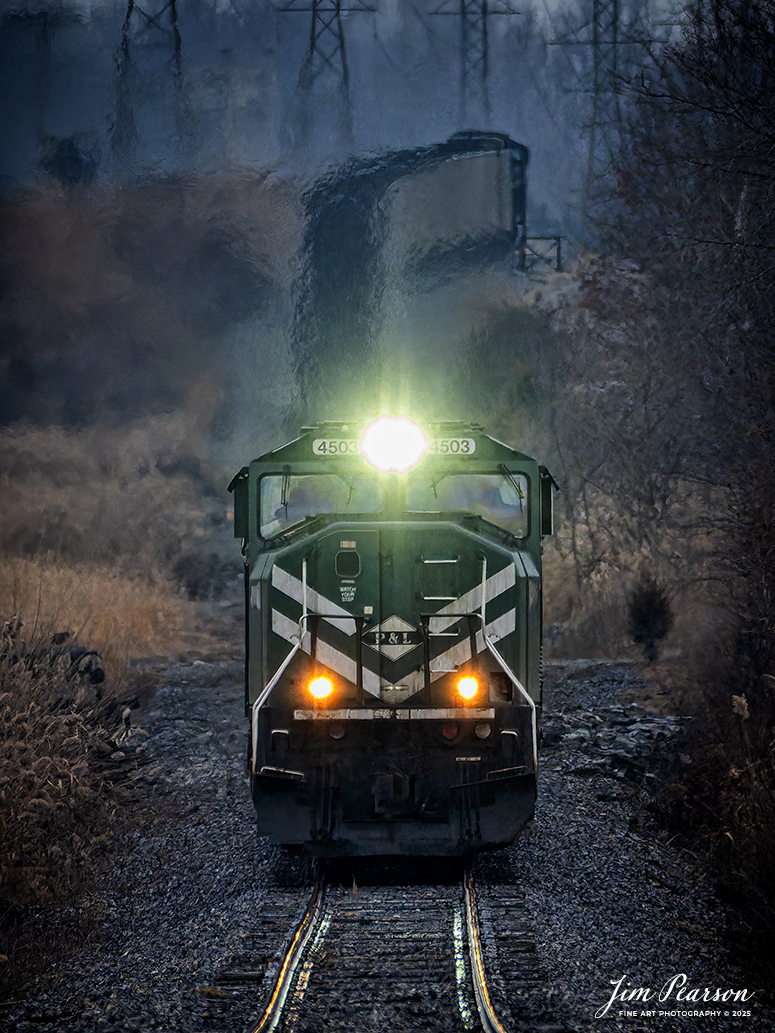 Paducah and Louisville Railway locomotive 4503 heads up a loaded Louisville, Gas and Electric coal train as they make their way out of the Warrior Coal loop after picking up a load of coal on January 30th, 2025, at Nebo, Kentucky.

Tech Info: Nikon Z30, RAW, Sigma 150-600 @ 560mm, f/6.3, 1/2500, ISO 4500.

#railroad #railroads #train, #trains #railway #railway #steamtrains #railtransport #railroadengines #picturesoftrains #picturesofrailways #besttrainphotograph #bestphoto #photographyoftrains #bestsoldpicture #JimPearsonPhotography #pal #paducahandlouisvillerailway