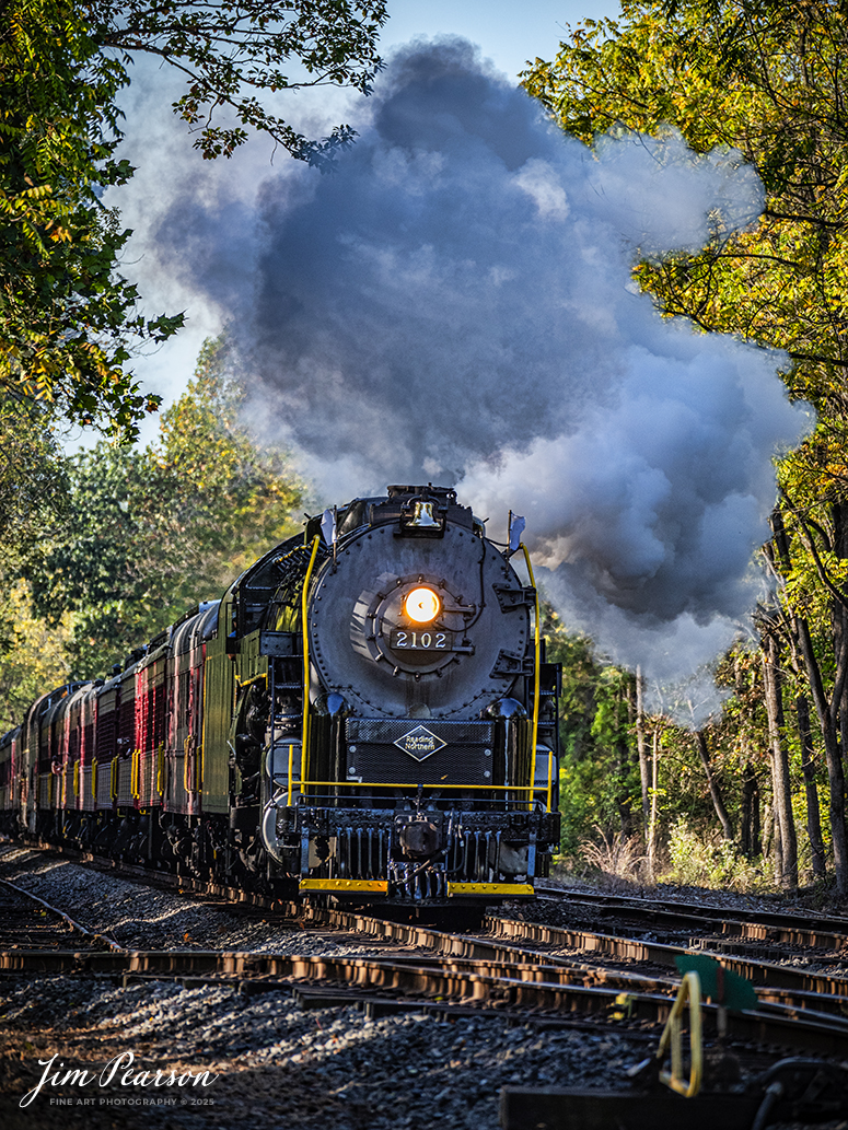 Reading Blue Mountain & Northern Railroad steam locomotive 2102 pulls through the countryside on October 5th, 2024, during its first day of the year of pulling Fall Foliage Excursions, as it heads for Jim Thorpe, Pennsylvania.

According to their website: The Reading Company T-1 class #2102 was built in the Reading’s own locomotive shops in 1945. With drivers of 70” diameter, it weighs 404 tons, and its tender holds up to 26 tons of coal, and up to 19,000 gallons of water. After the Reading Steam era was over, the Reading Company used 2102 for the Reading Rambles on several different excursions. The 2102 has had many different owners since it was retired by the Reading Railroad. It is one of only four to survive. The other remaining locomotives are the 2100, 2101, and 2124.

The Blue Mountain and Reading Railroad purchased the 2102 in 1987, and it ran on the Temple to South Hamburg line into the early 1990’s. Once the Blue Mountain and Reading Railroad became the Reading Blue Mountain & Northern, the 2102 ran over Reading & Northern’s rails for a short time before it was removed from service in the early 1990’s. 

In 2022, steam locomotive 2102 reentered service on the Reading & Northern. The locomotive has been used actively to pull both passenger excursions and revenue freight trains.

Tech Info: Nikon D810, RAW, Nikon 70-300 @ 300mm,  1/640, f/5.6, ISO 640.

#steamtrains #besttrainphotograph #JimPearsonPhotography #RBNRR