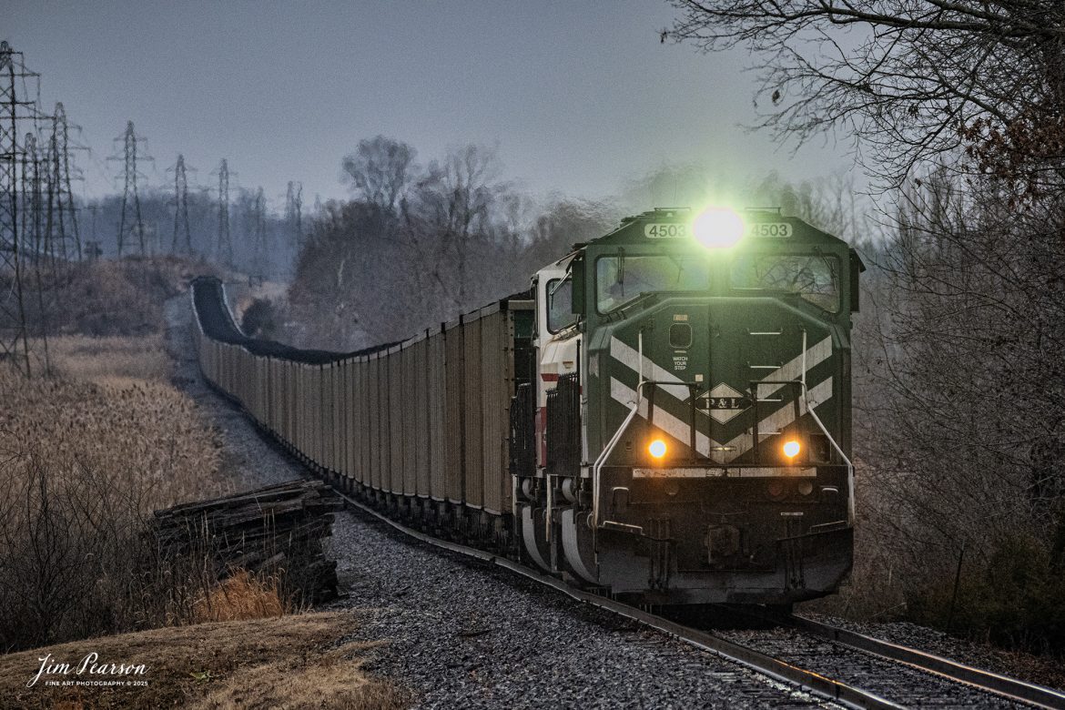 Paducah and Louisville Railway locomotive 4503 heads up a loaded Louisville, Gas and Electric coal train as they make their way out of the Warrior Coal loop after picking up a load of coal on January 30th, 2025, at Nebo, Kentucky.

Tech Info: Nikon Z30, RAW, Sigma 150-600 @ 320mm, f/5.6, 1/2500, ISO 2800.

#railroad #railroads #train, #trains #railway #railway #steamtrains #railtransport #railroadengines #picturesoftrains #picturesofrailways #besttrainphotograph #bestphoto #photographyoftrains #bestsoldpicture #JimPearsonPhotography #pal #paducahandlouisvillerailway