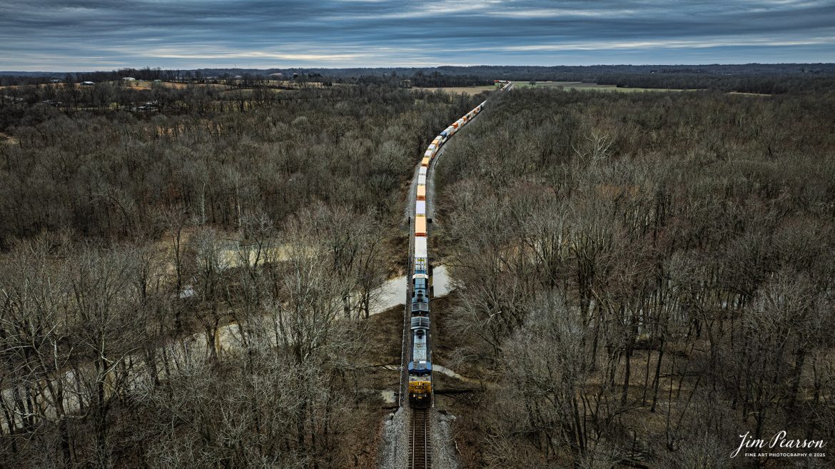 CSX hot intermodal I128, as it heads northbound out Breton, Ky, as it crosses over the Green River, just south of Sebree, Ky, on the CSX Henderson Subdivision on January 23rd, 2024.

Tech Info: DJI Mavic 3 Classic Drone, RAW, 24mm, f/2.8, 1/500, ISO 210.

#railroad #railroads #train, #trains #railway #railway #railtransport #railroadengines #picturesoftrains #picturesofrailways #besttrainphotograph #bestphoto #photographyoftrains #bestsoldpicture #JimPearsonPhotography #trainsfromadrone