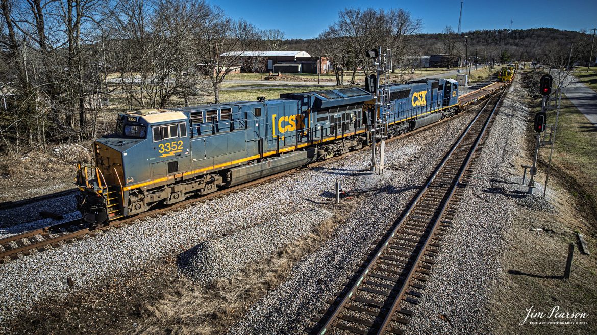 CSXT 3352 and 4751 lead empty coal train E003 pulls onto the cutoff at Mortons Junction as they head north on February 28th, 2025, on the CSX Henderson Subdivision. The first string of cars on this move was CSX MOW equipment and everything was headed for CSX Atkinson Yard in Madisonville, Ky. 

Tech Info: DJI Mavic 3 Classic Drone, RAW, 22mm, f/2.8, 1/2000, ISO 180.

#railroad #railroads #train, #trains #railway #railway #railtransport #railroadengines #picturesoftrains #picturesofrailways #besttrainphotograph #bestphoto #photographyoftrains #bestsoldpicture #JimPearsonPhotography #trainsfromadrone #flooding #csxhendersonsubdivision #onecsx