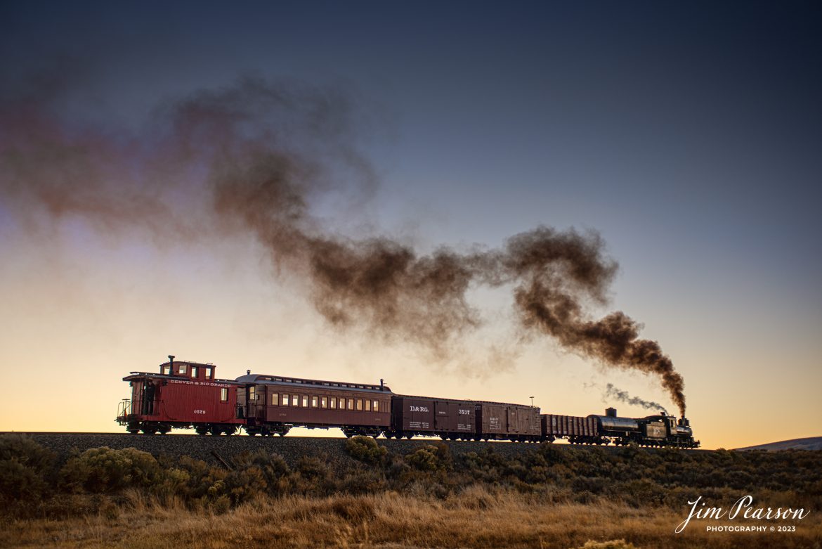 Cumbres & Toltec Scenic Railroad steam locomotive D&RGW 168 heads through the countryside at sunrise on its way to Osier, Colorado, during a photo charter by Dak Dillon Photography on October 20th, 2023.

According to their website: the Cumbres & Toltec Scenic Railroad is a National Historic Landmark.  At 64-miles in length, it is the longest, the highest and most authentic steam railroad in North America, traveling through some of the most spectacular scenery in the Rocky Mountain West.

Owned by the states of Colorado and New Mexico, the train crosses state borders 11 times, zigzagging along canyon walls, burrowing through two tunnels, and steaming over 137-foot Cascade Trestle. All trains steam along through deep forests of aspens and evergreens, across high plains filled with wildflowers, and through a rocky gorge of remarkable geologic formations. Deer, antelope, elk, fox, eagles and even bear are frequently spotted on this family friendly, off-the grid adventure.

Tech Info: Nikon D810, RAW, Sigma 24-70 @ 46mm, f/3.2, 1/320, ISO 72.

railroad, railroads train, trains, best photo. sold photo, railway, railway, sold train photos, sold train pictures, steam trains, rail transport, railroad engines, pictures of trains, pictures of railways, best train photograph, best photo, photography of trains, steam, train photography, sold picture, best sold picture, Jim Pearson Photography, Cumbres & Toltec Scenic Railroad