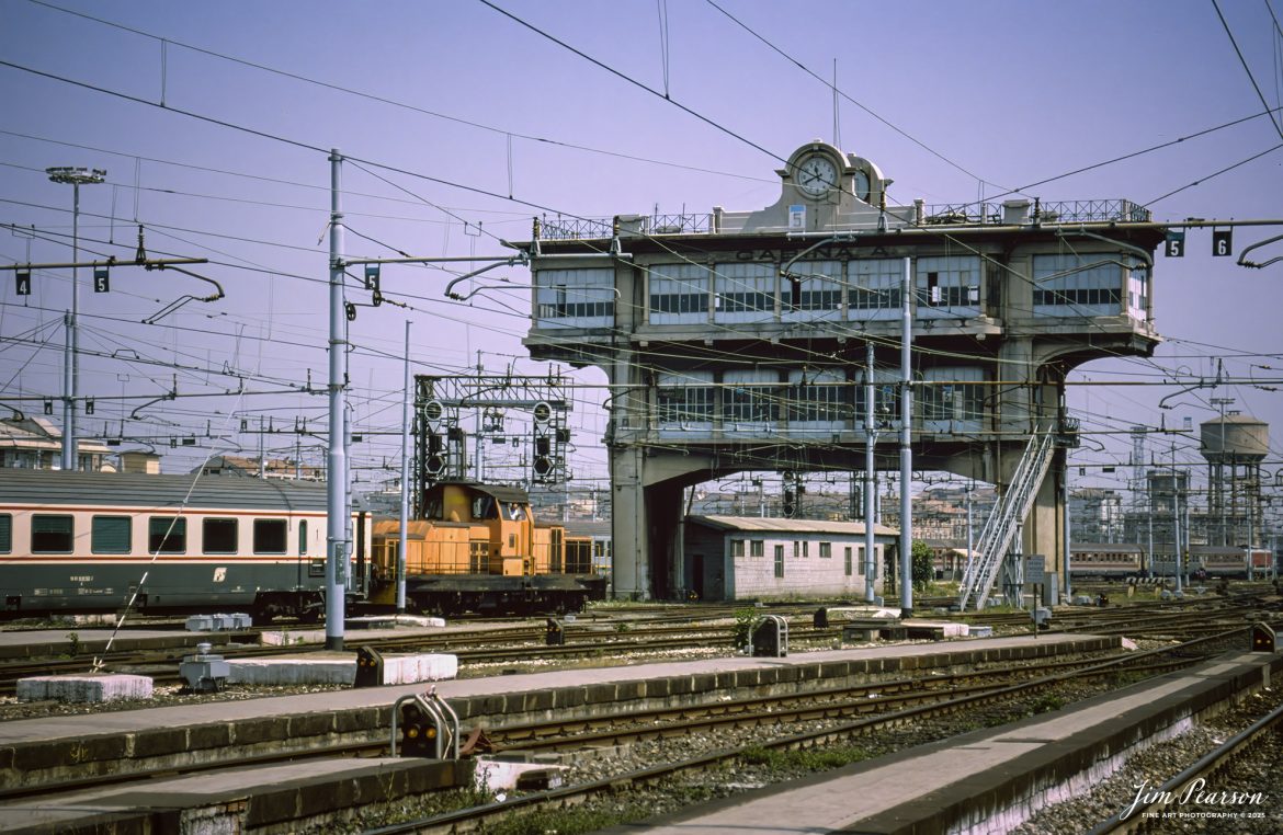 Film Wednesday – 1993 – This is a shot a yard engine building a passenger train at the Milano Centrale railway station in Milan, Italy one of two distinctive disused signal cabins, or control towers as we know them in the USA. From what I found on the web this tower was in operation from 1931 till 1984, after a new Milan metro opens centralised control centre was built and opened. 

Today’s scanned slides were all taken at various places during the time I was deployed during (from Wikipedia) “Operation Deny Flight which was a North Atlantic Treaty Organization (NATO) operation that began on 12 April 1993 as the enforcement of a United Nations (UN) no-fly zone over Bosnia and Herzegovina.”

“The United Nations and NATO later expanded the mission of the operation to include providing close air support for UN troops in Bosnia and carrying out coercive air strikes against targets in Bosnia. Twelve NATO members contributed forces to the operation and, by its end on 20 December 1995, NATO pilots had flown 100,420 sorties.”

Also from Wikipedia: We were also part of “Operation Provide Hope which was a humanitarian operation conducted by the U.S. Air Force starting in 1992 to provide medical equipment to former Soviet republics during their transition to freedom from the USSR until 1994.
For 6-months of this operation I was the photo editor for a Combat Camera team that worked out of Aviano, Italy covering both operations. On the weekends, our schedules allowed us some time to travel and on my days off I traveled and today’s photos, along with many others.

Tech Info: Camera, Nikon F3, Ektachrome Slide Film, no other data recorded, Scanned with an Epson Perfection V700 PHOTO scanner.

#slidescan #filmphotography #trains #railroads #jimpearsonphotography #FilmPhotography