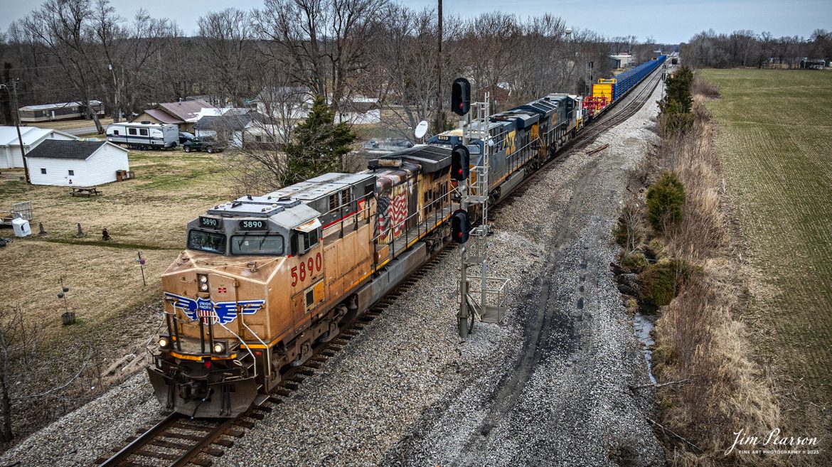 Union Pacific 5890 leads CSX W017, a brand new loaded continuous rail train, as it passes the signals at the south end of the siding at Crofton, Kentucky on March 4th, 2025, on the CSX Henderson Subdivision.

Tech Info: DJI Mavic 3 Classic Drone, RAW, 22mm, f/2.8, 1/1000, ISO 120.

#railroad #railroads #train, #trains #railway #railway #railtransport #railroadengines #picturesoftrains #picturesofrailways #besttrainphotograph #bestphoto #photographyoftrains #bestsoldpicture #JimPearsonPhotography #trainsfromadrone #trainderailment #csxhendersonsubdivision #onecsx